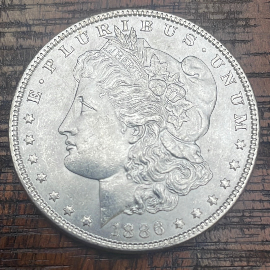 1886 $1 US Morgan Silver Dollar