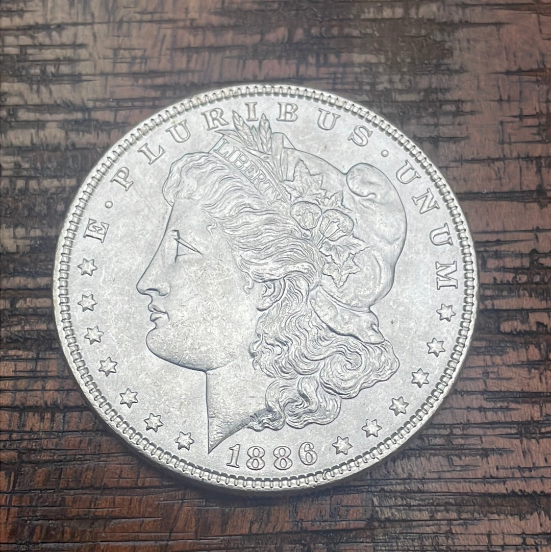 1886 $1 US Morgan Silver Dollar