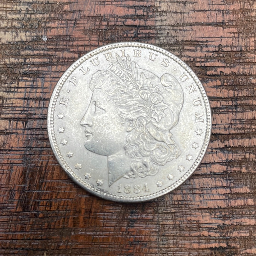 1884 $1 US Morgan Silver Dollar