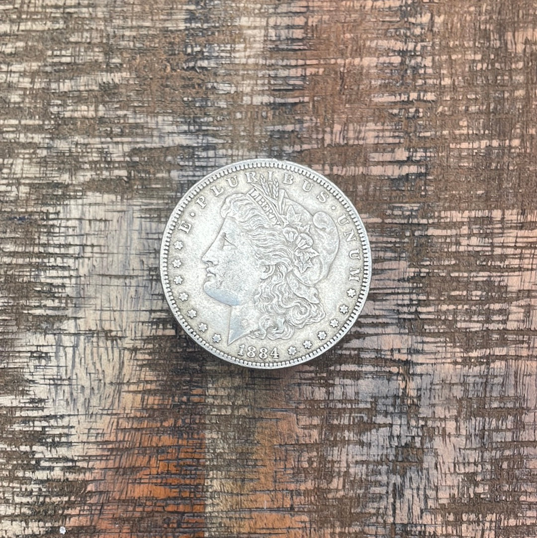 1884 $1 US Morgan Silver Dollar