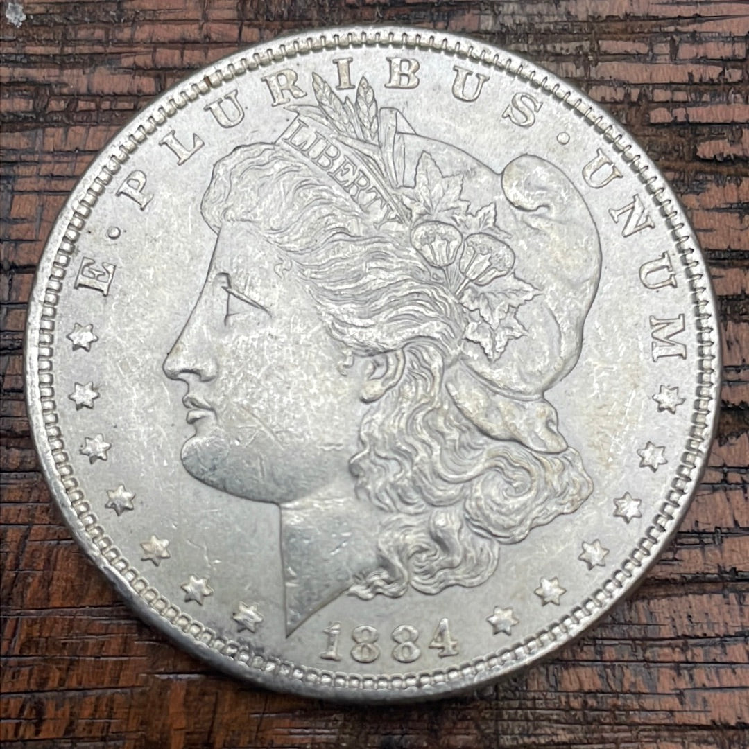 1884 $1 US Morgan Silver Dollar