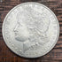 1884 $1 US Morgan Silver Dollar