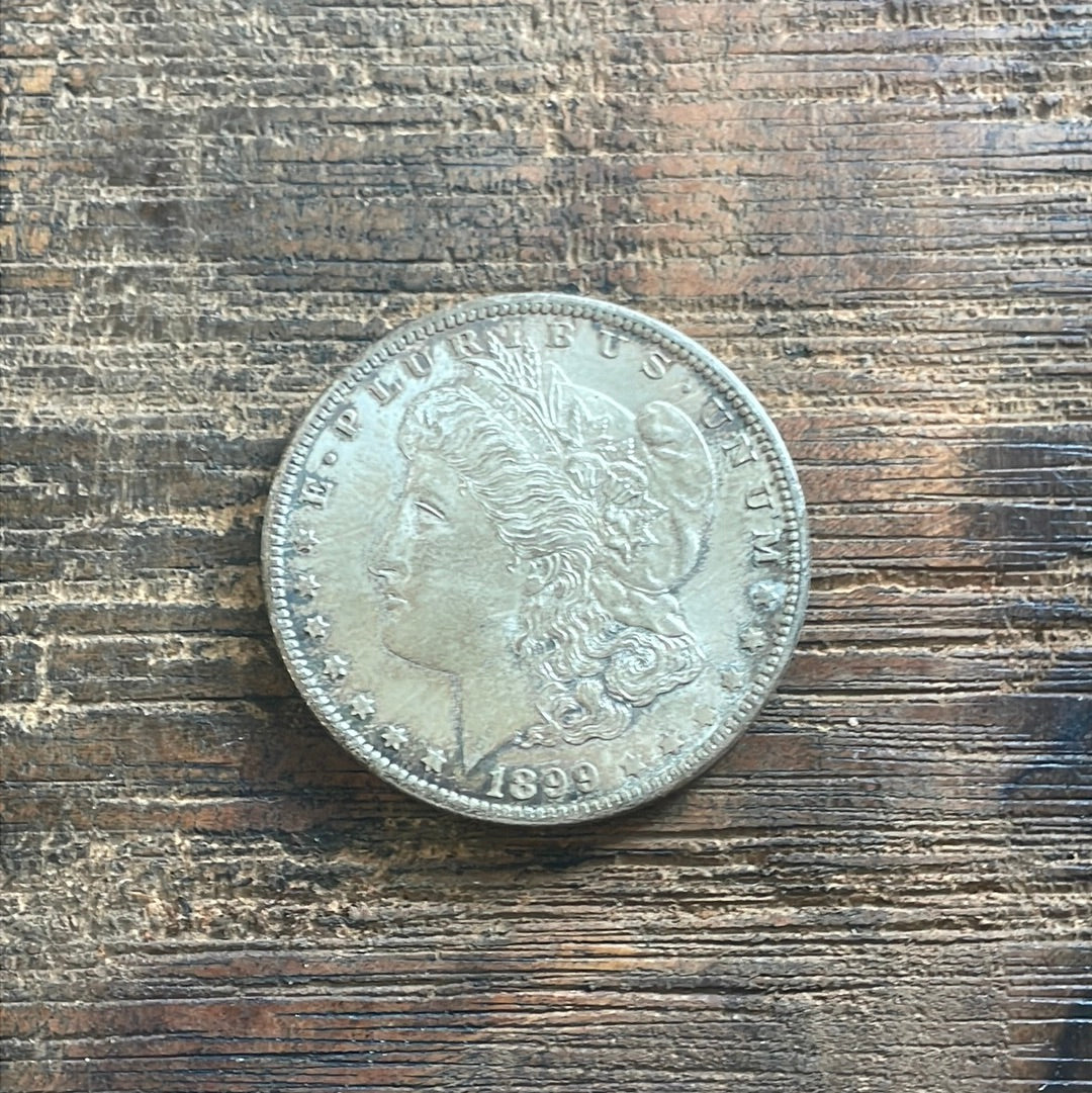 1899-O $1 US Morgan Silver Dollar