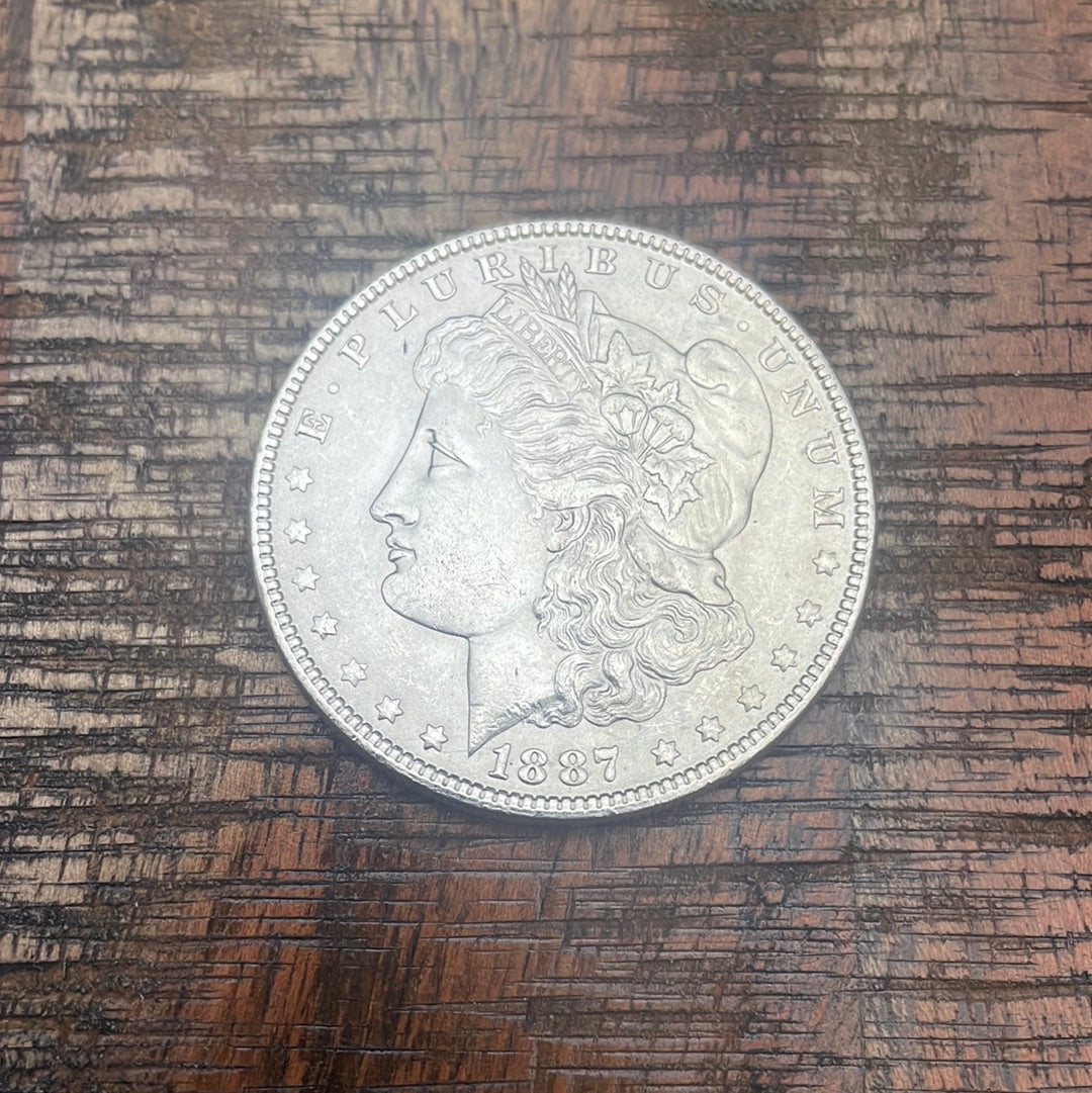 1887 $1 US Morgan Silver Dollar