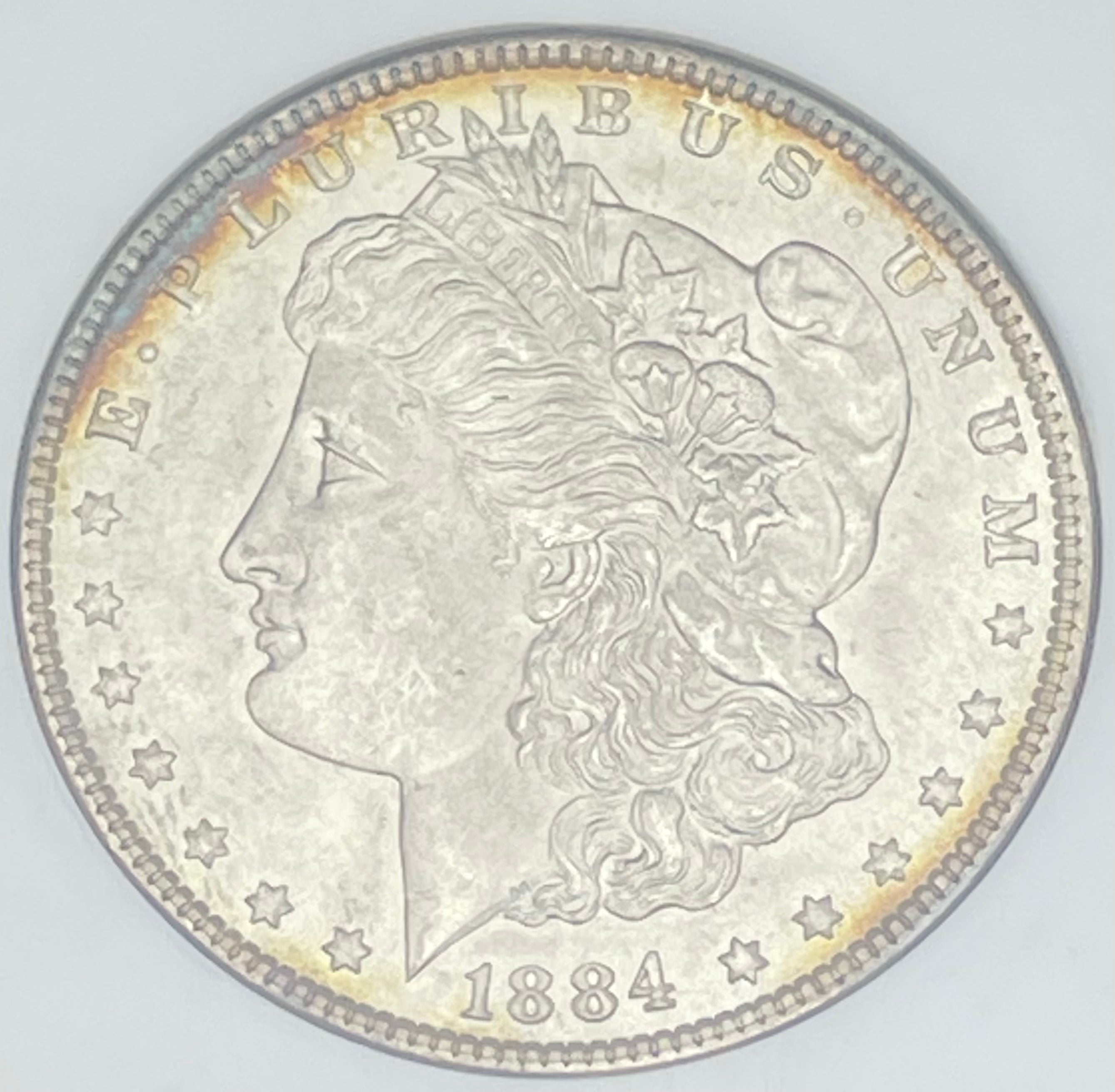 1884 $1 US Morgan Silver Dollar NGC MS64