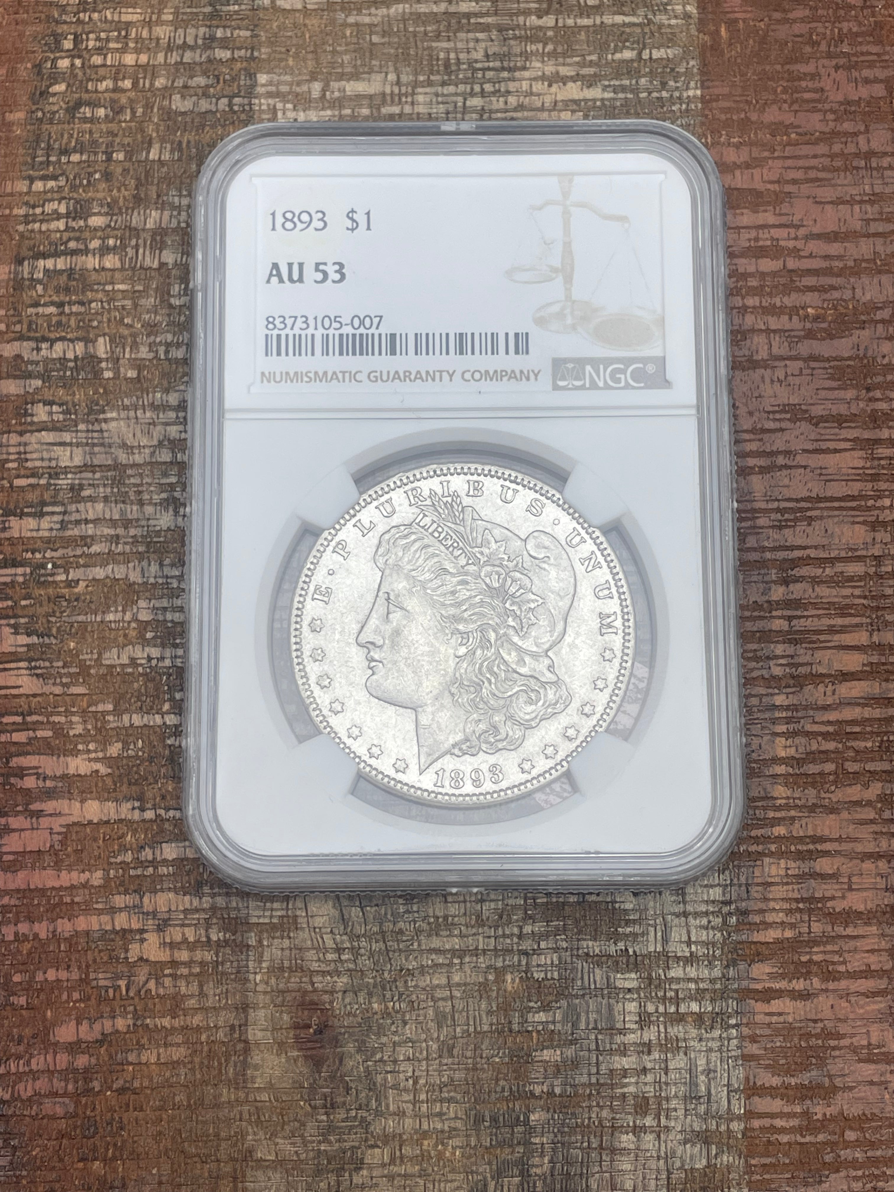 1893 $1 US Morgan Silver Dollar NGC AU53