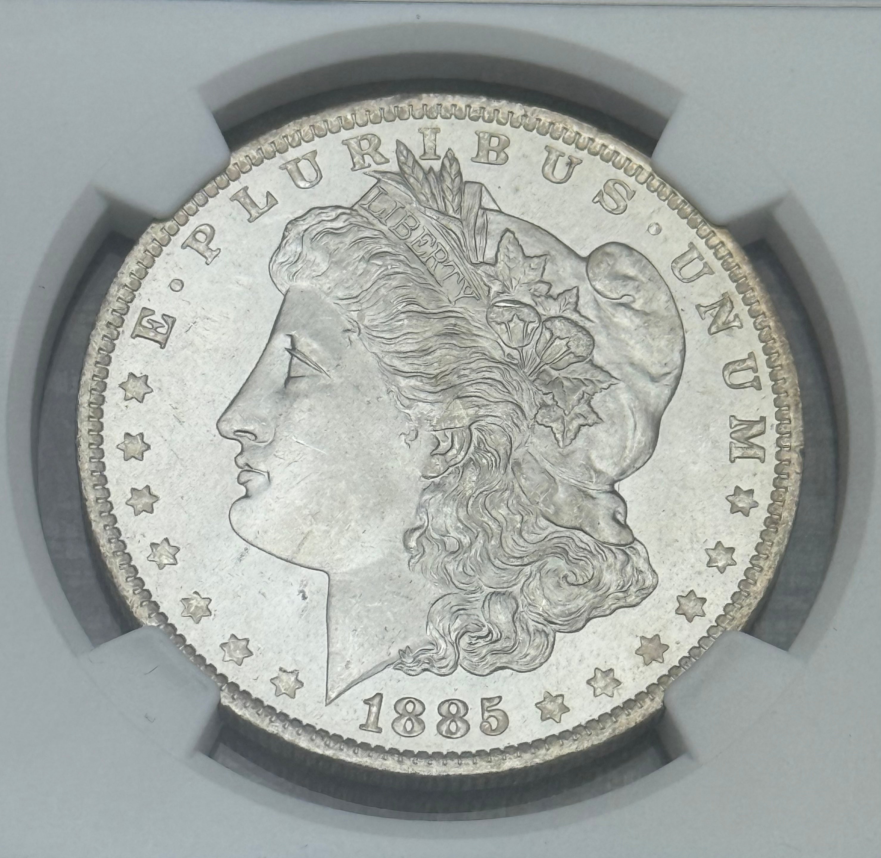 1885-O $1 US Morgan Silver Dollar NGC MS64