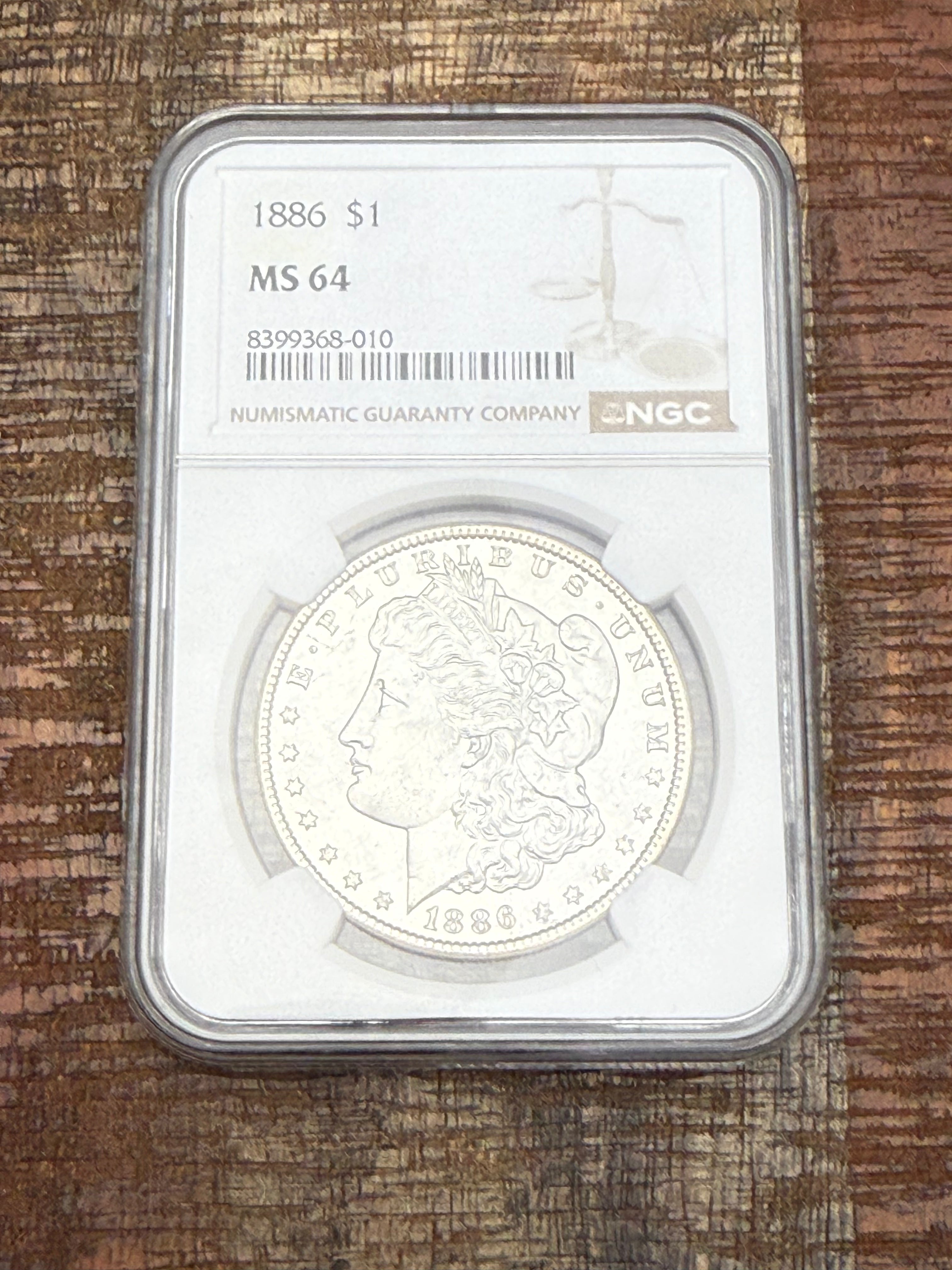 1886 $1 US Morgan Silver Dollar NGC MS64
