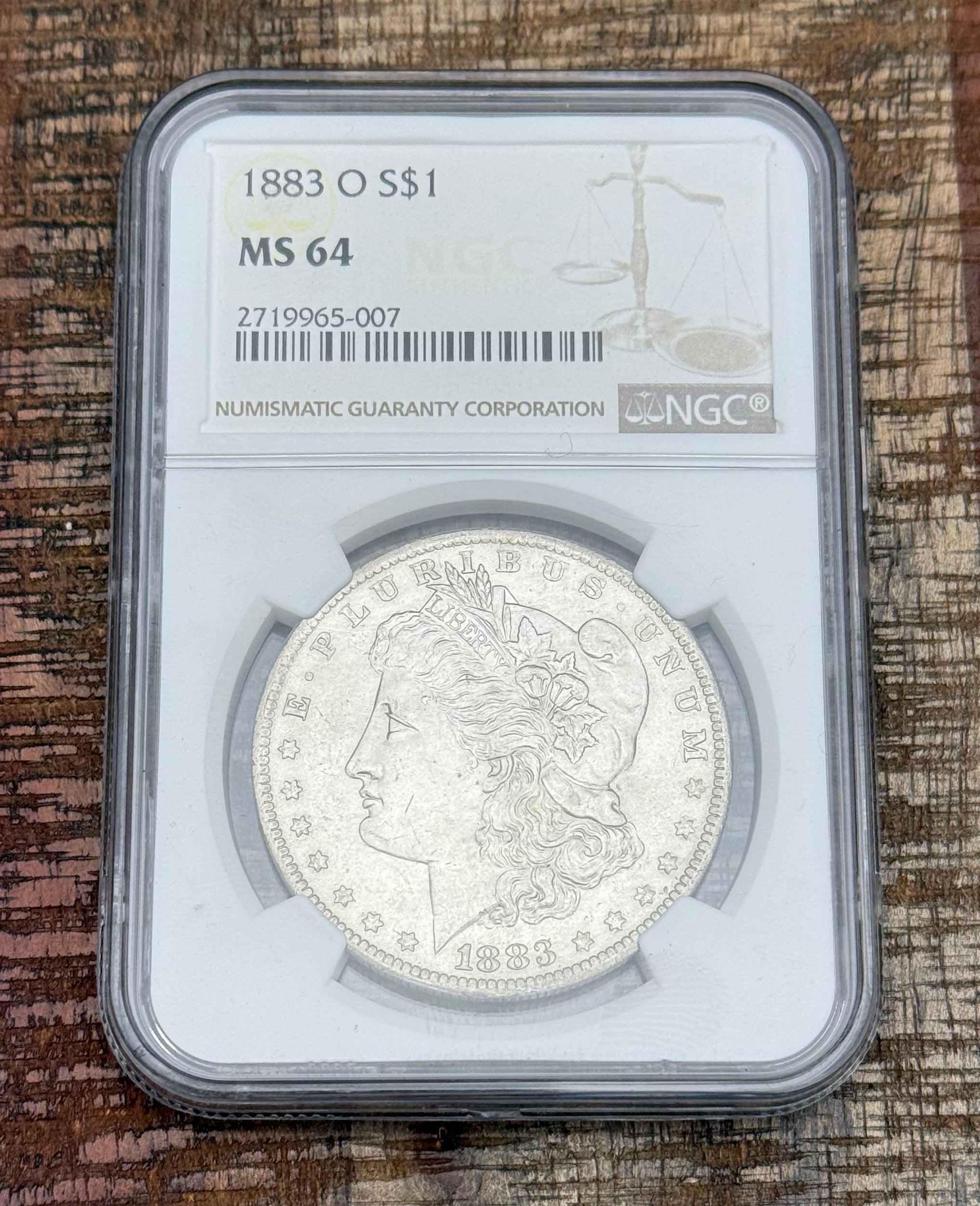 1883-O $1 US Morgan Silver Dollar NGC MS64