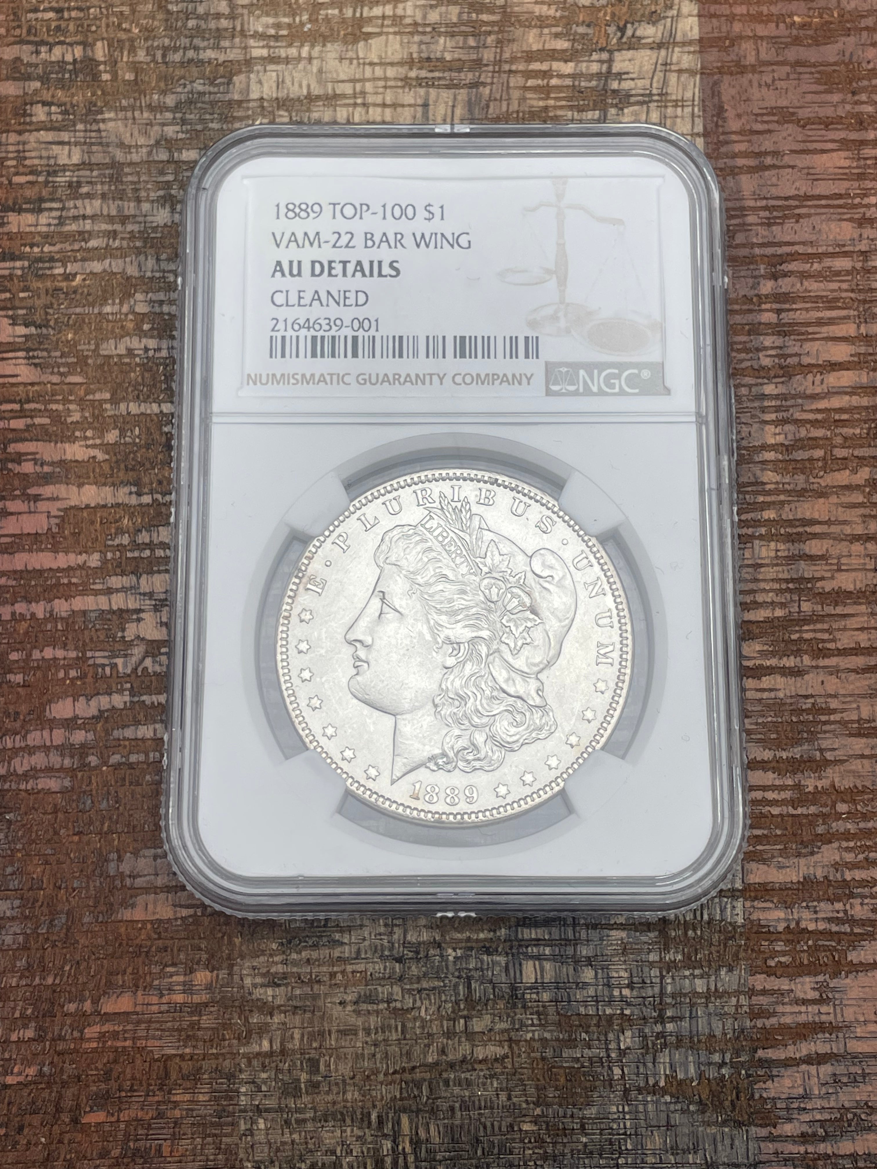 1889 $1 US Morgan Silver Dollar ~ Top-100 ~ VAM-22 BAR WING ~ NGC AU Details - Cleaned