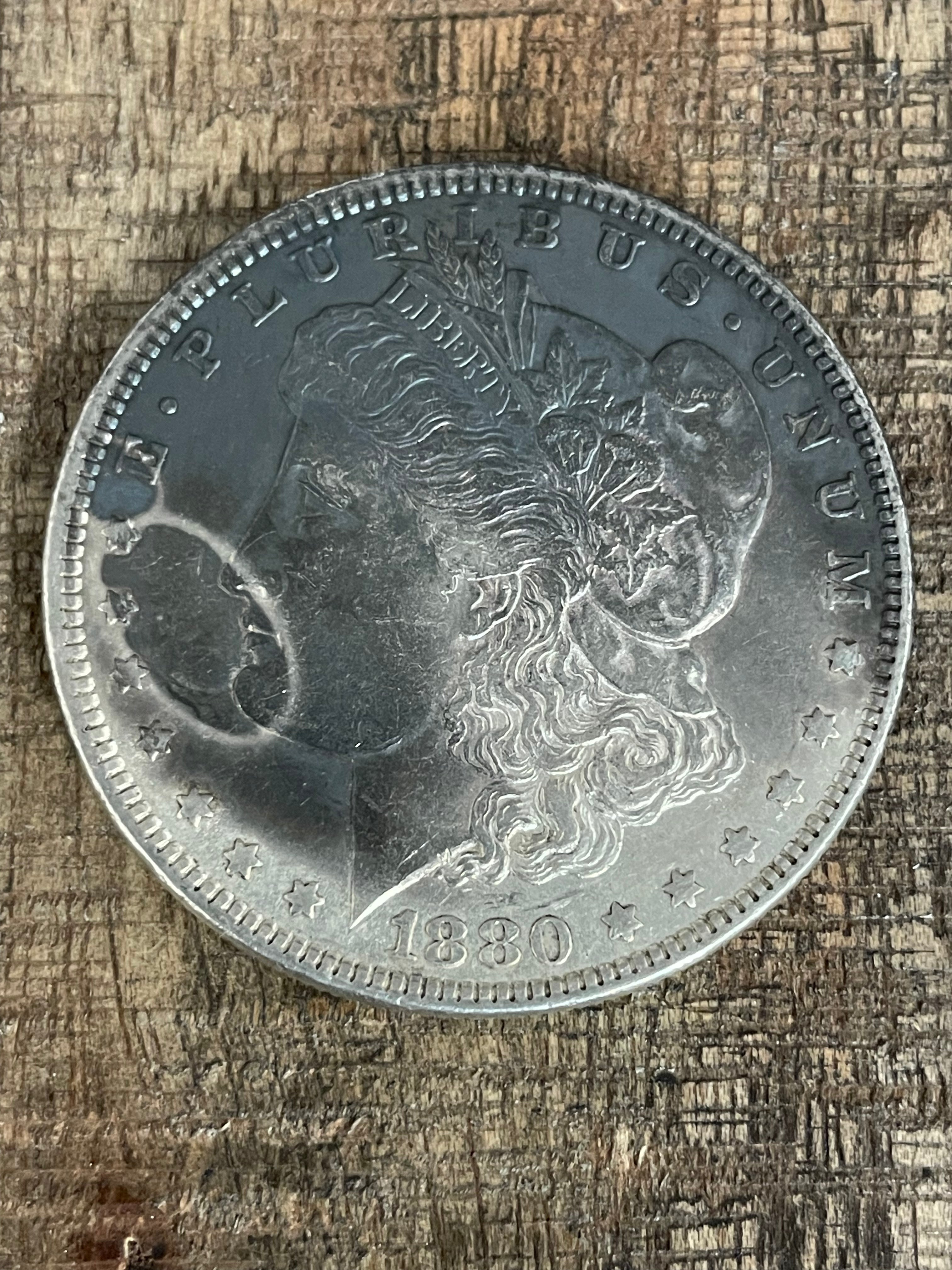 1880 $1 US Morgan Silver Dollar.