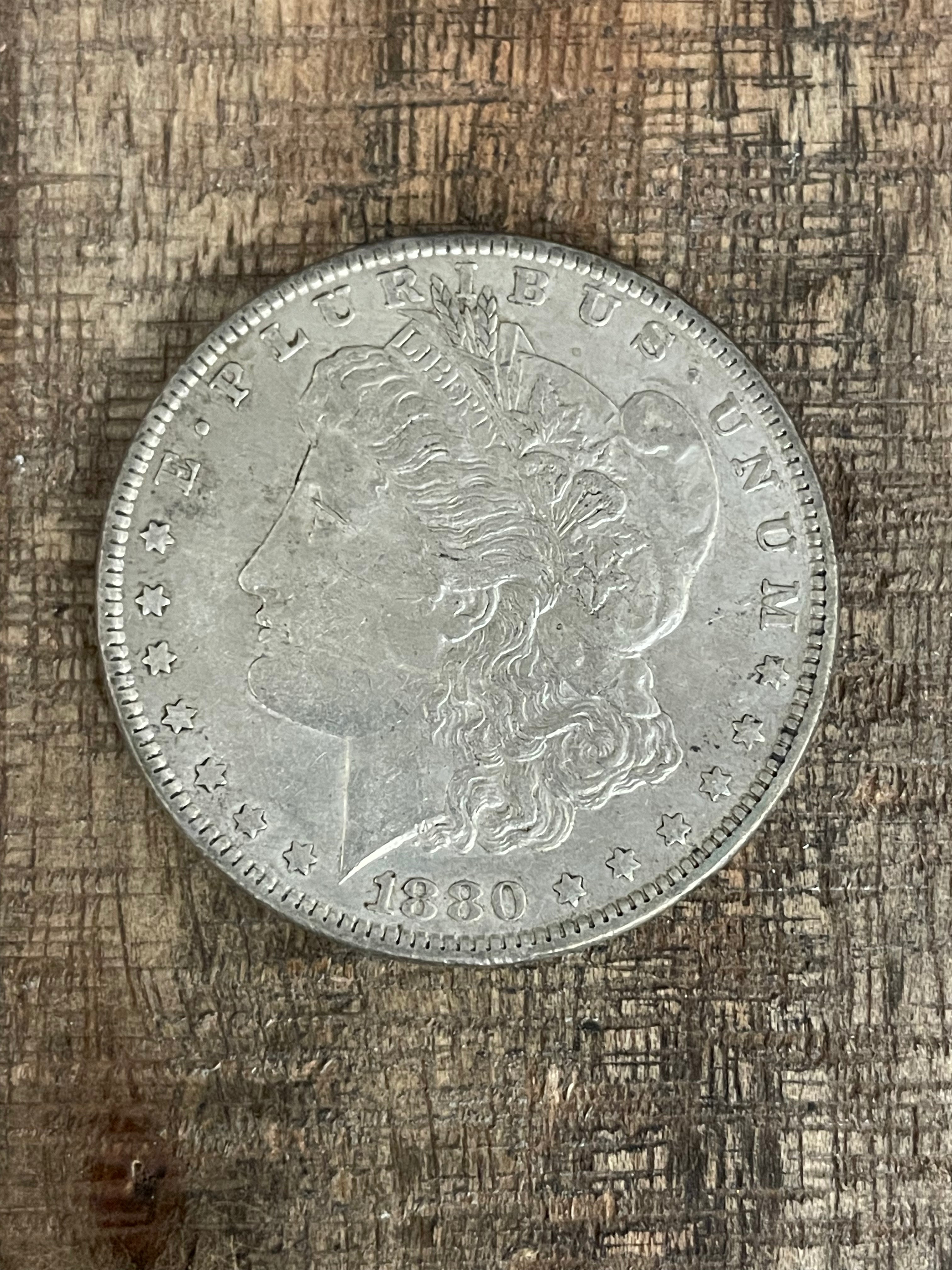 1880-O $1 US Morgan Silver Dollar