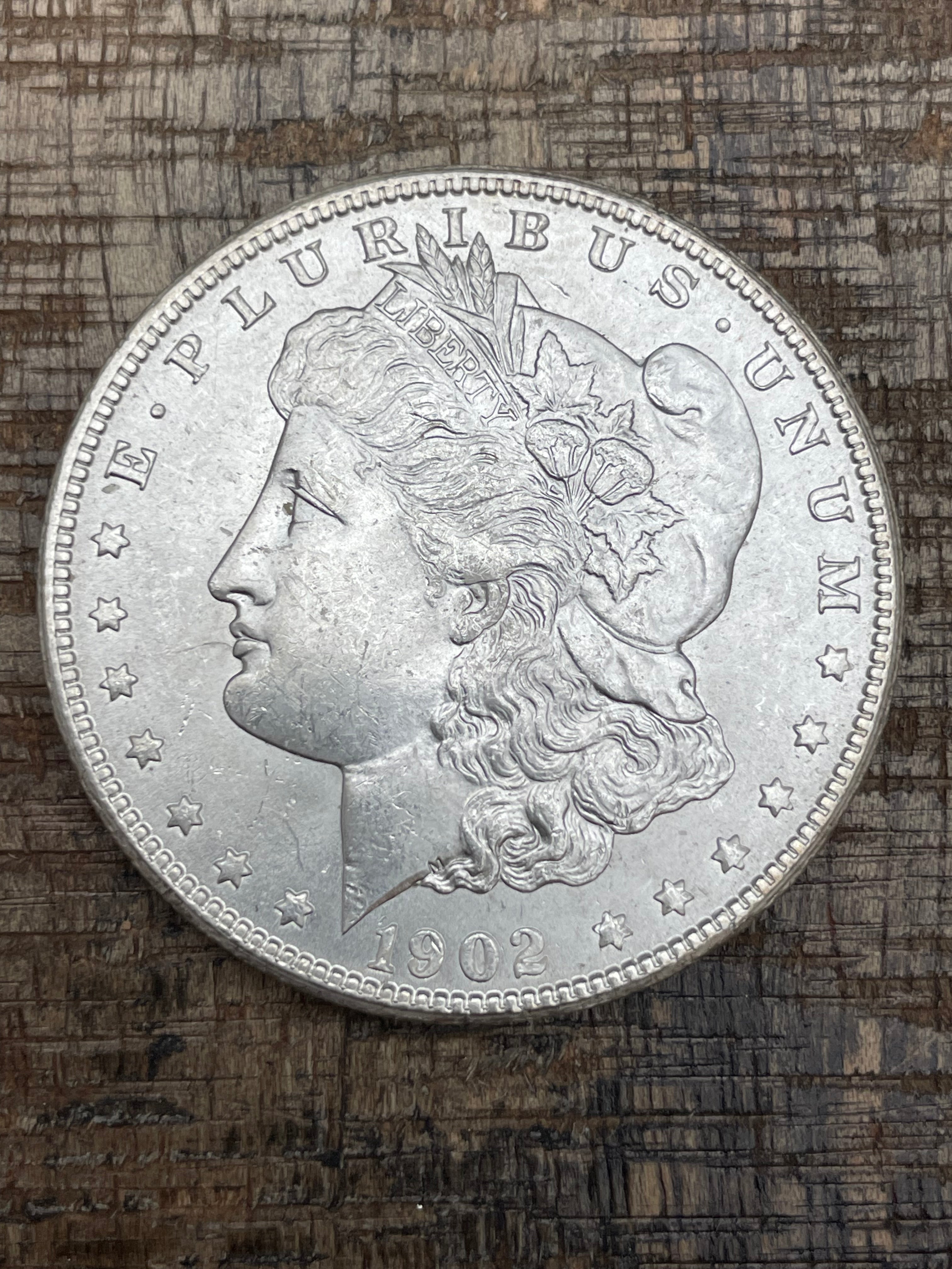 1902-O $1 US Morgan Silver Dollar
