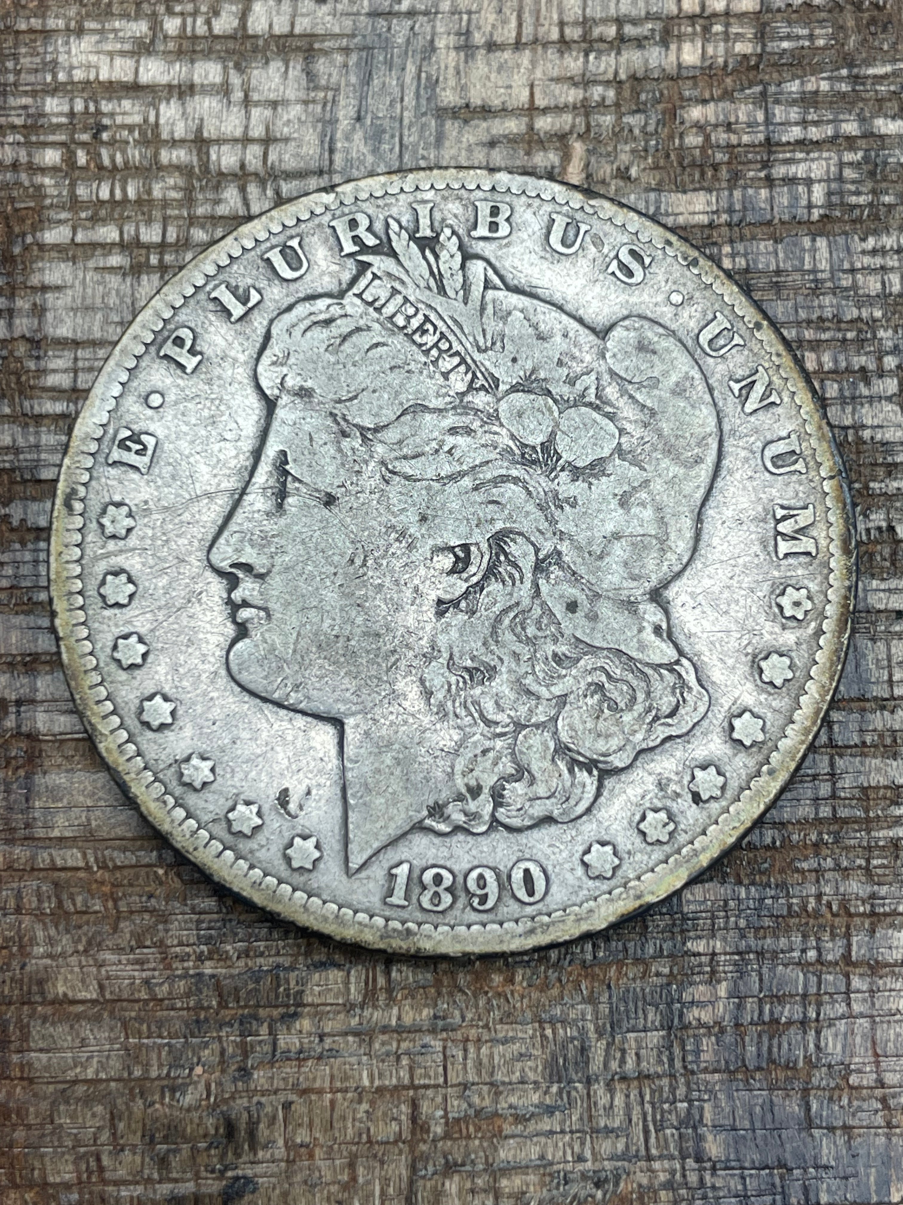 1890-CC $1 US Morgan Silver Dollar