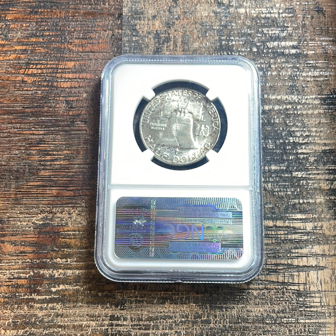 1954 50c Franklin Half Dollar NGC MS66 Rainbow Toned