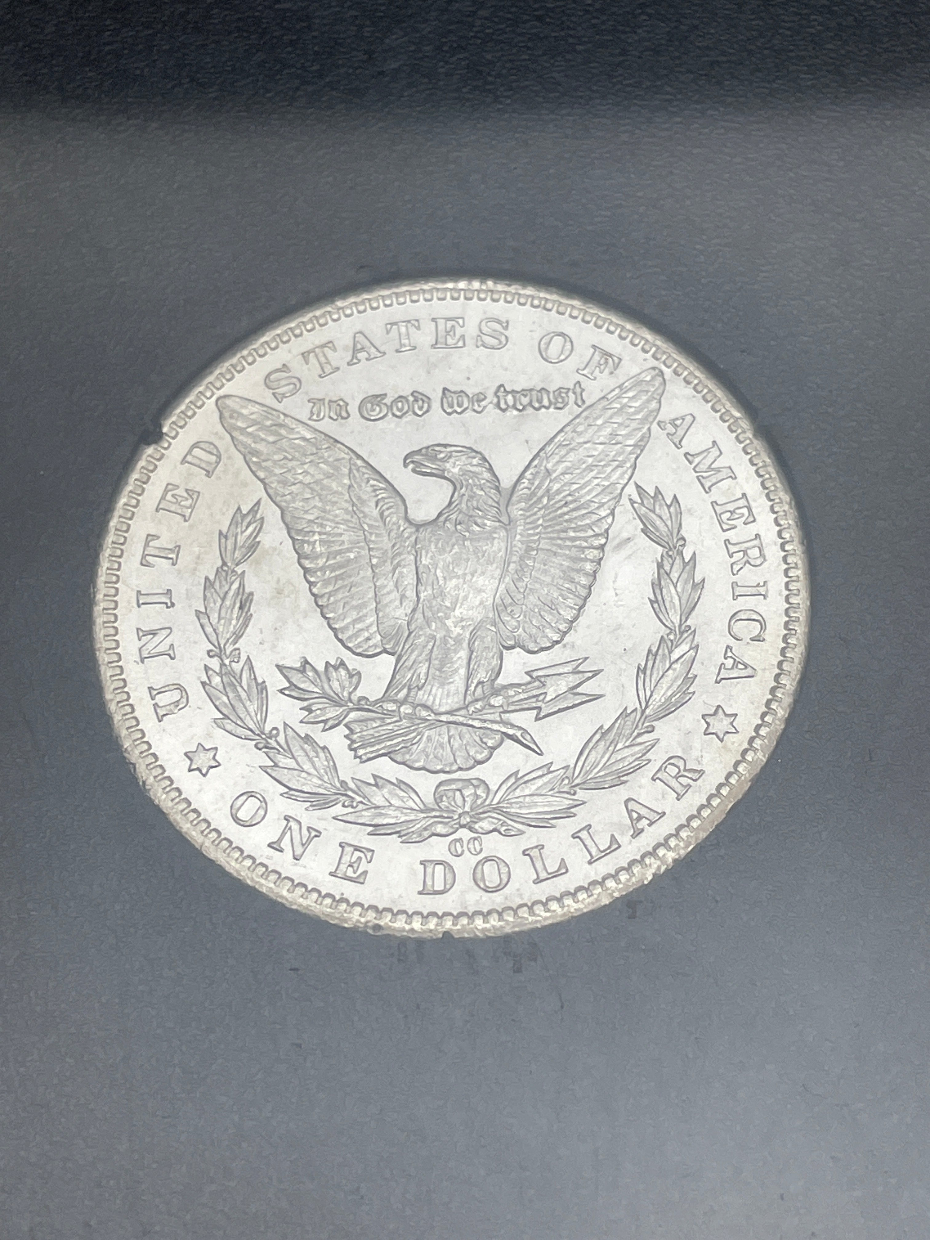 1884-CC $1 US Morgan Silver Dollar GSA Carson City