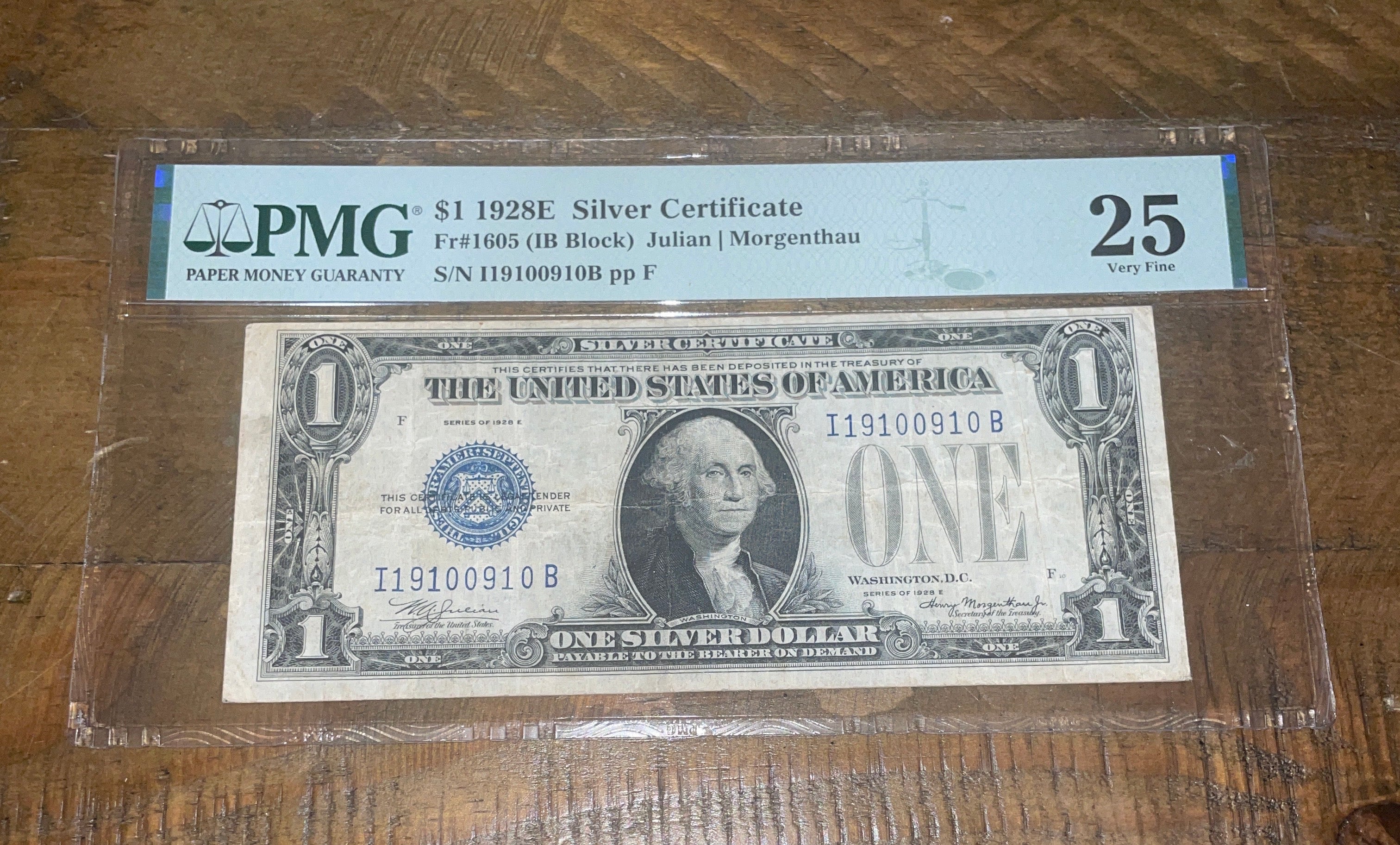 1928E $1 Silver Certificate Funny Back FR#1605 *RARE* KEY NOTE PMG 25