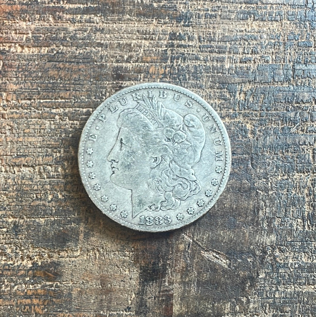 1883 $1 US Morgan Silver Dollar