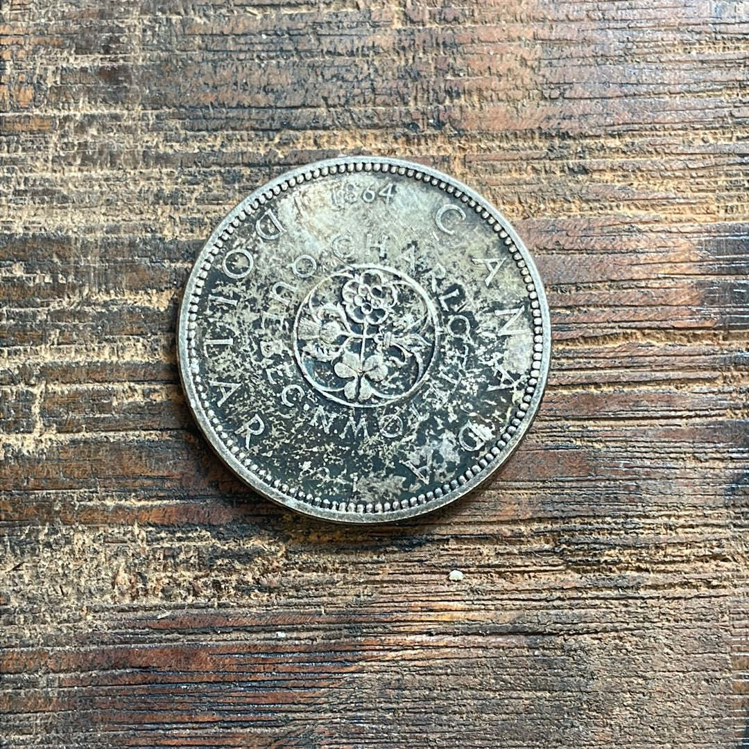 1964 Canadian Commemorative Silver Dollar.