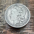 1884 $1 US Morgan Silver Dollar
