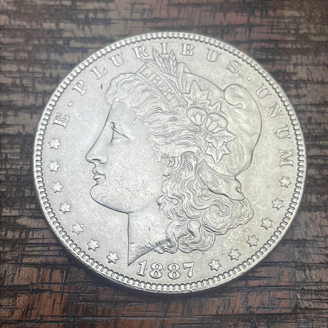 1887 $1 US Morgan Silver Dollar