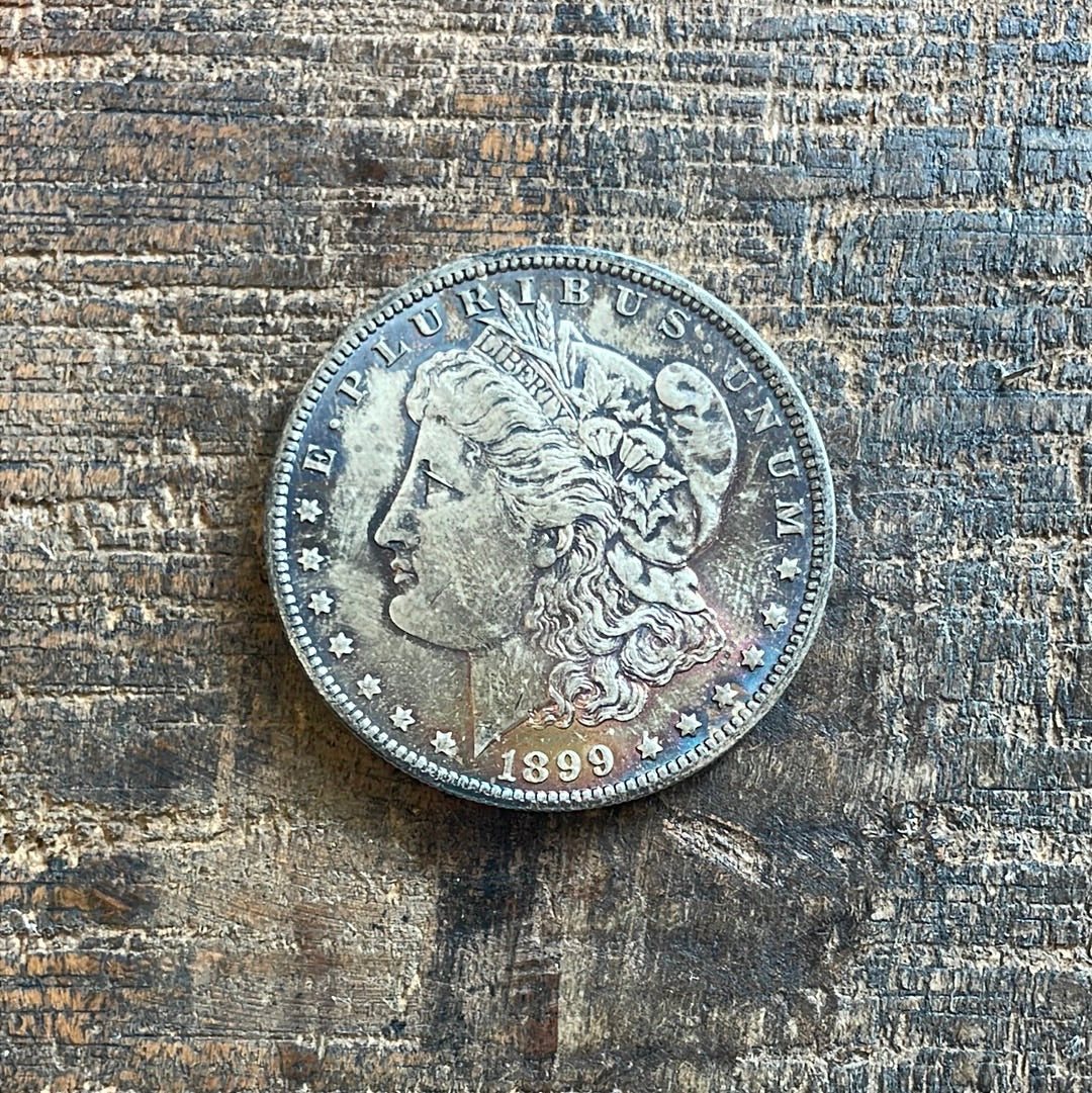 1899-O $1 US Morgan Silver Dollar