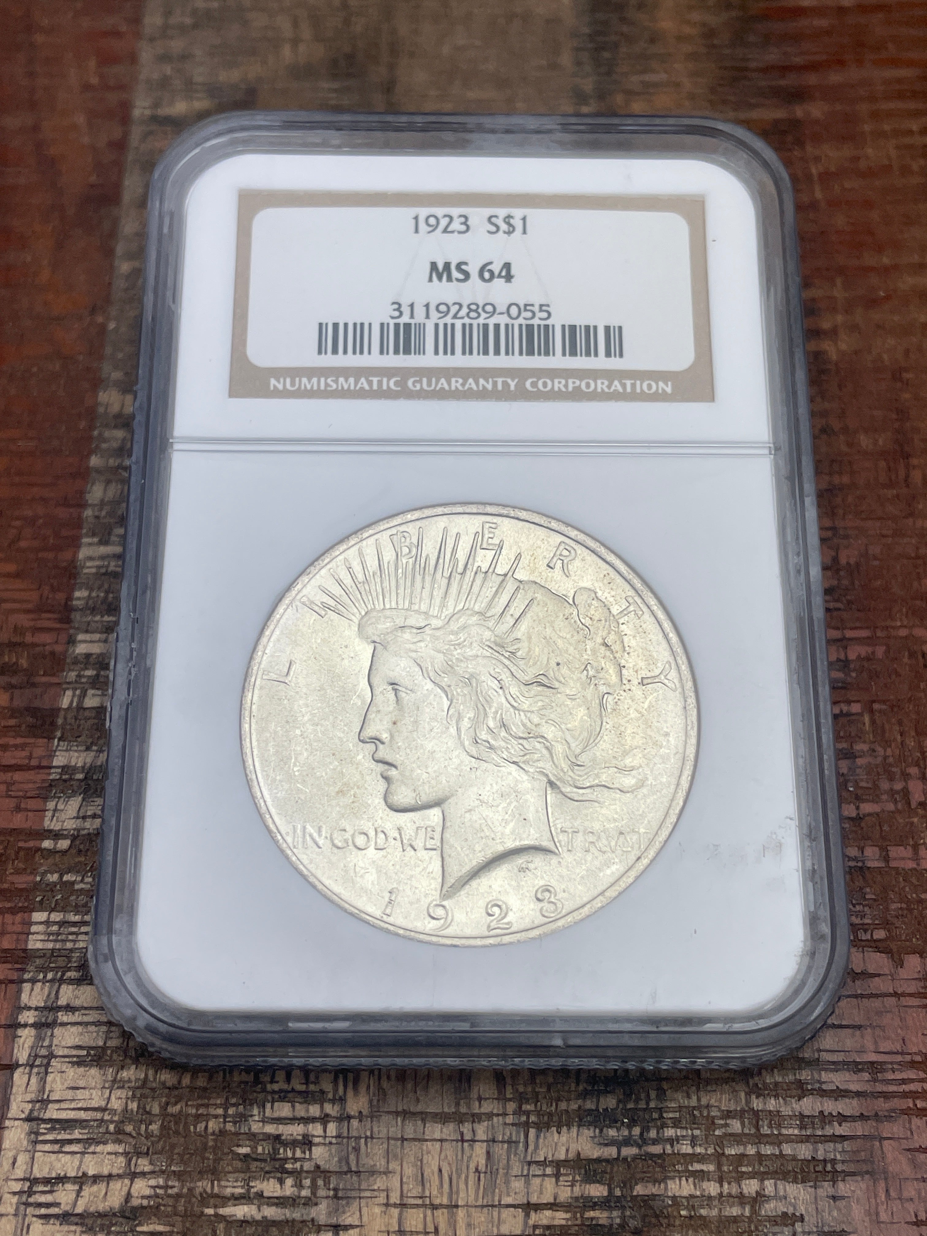 1923 US $1 Peace Silver Dollar NGC MS64