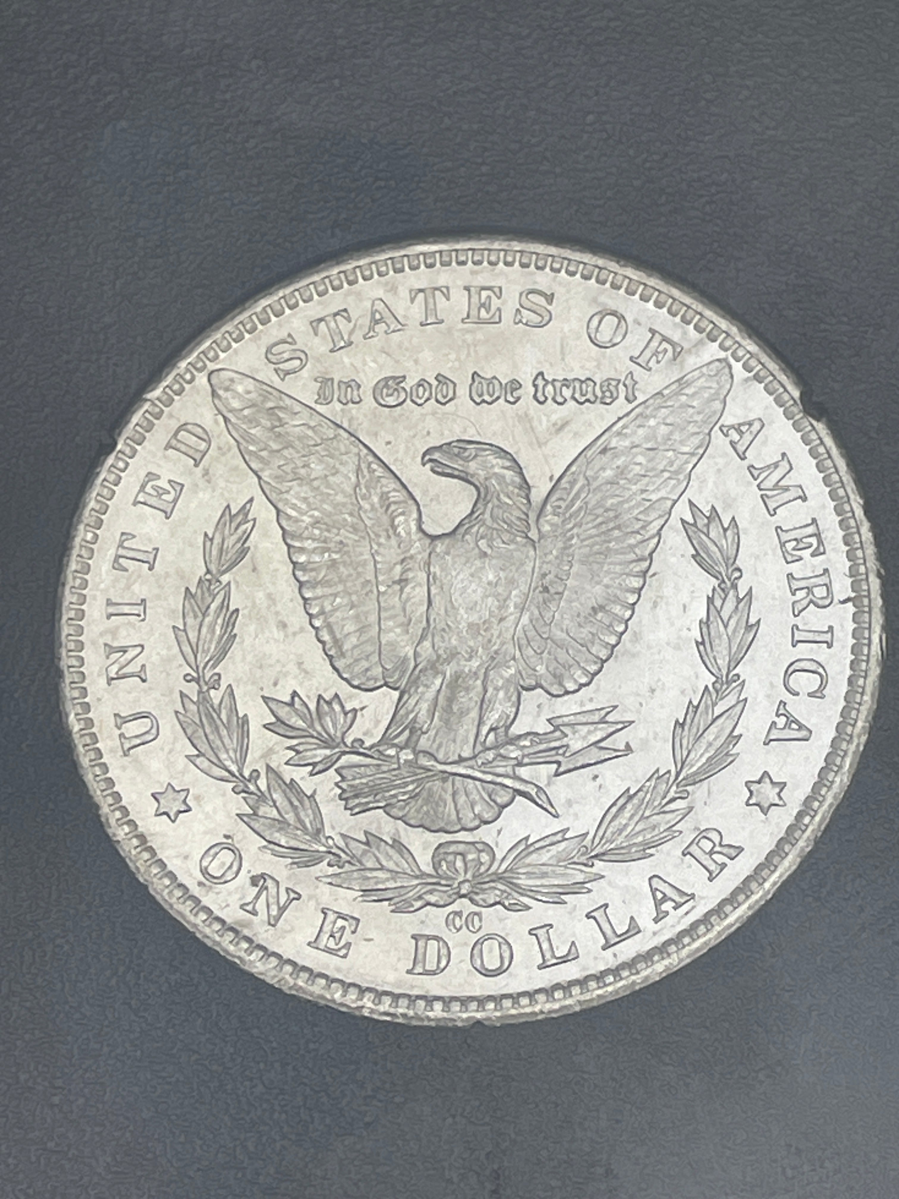 1883-CC $1 US Morgan Silver Dollar GSA Carson City ~ VAM 8A