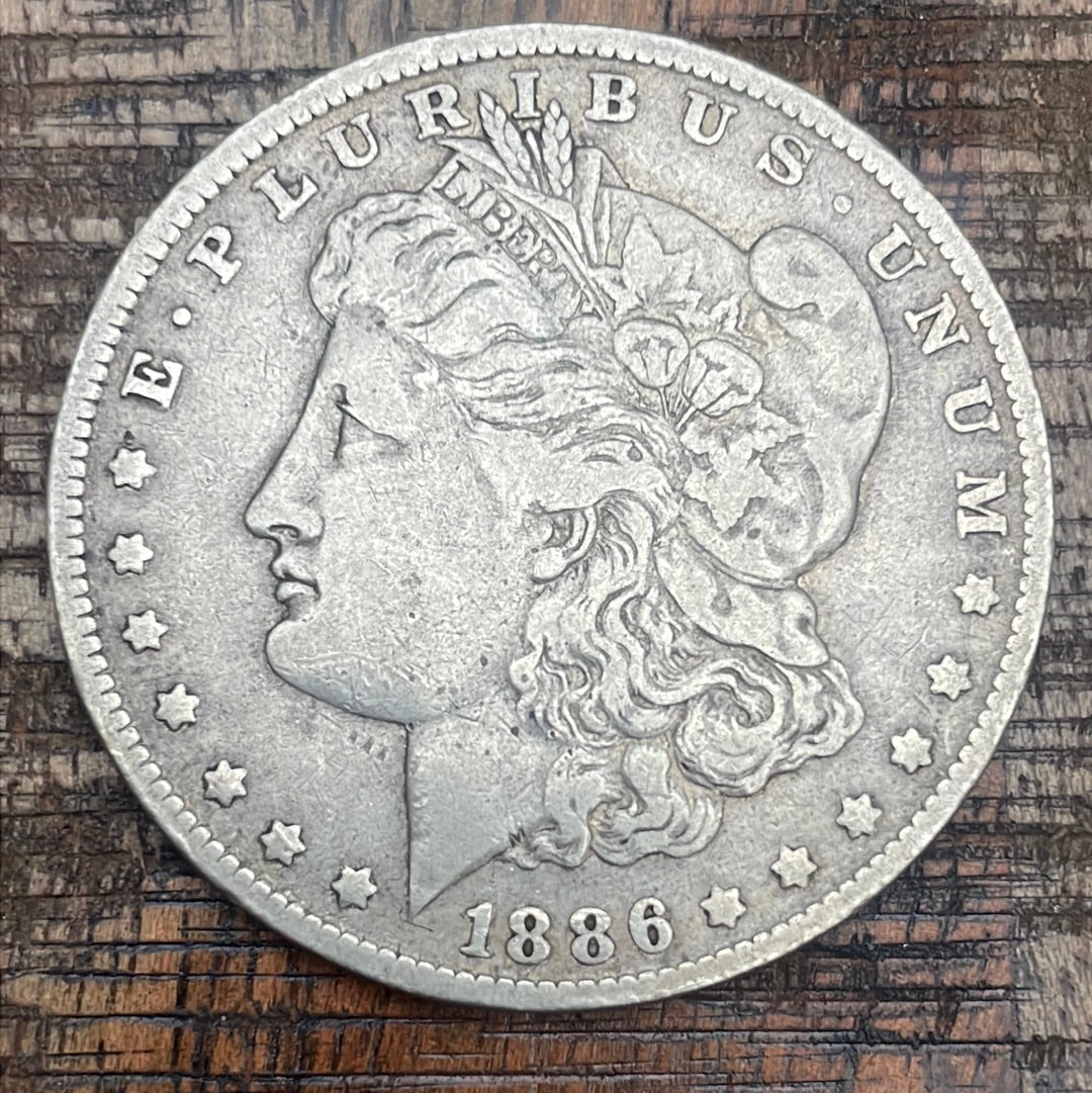 1886-O $1 US Morgan Silver Dollar