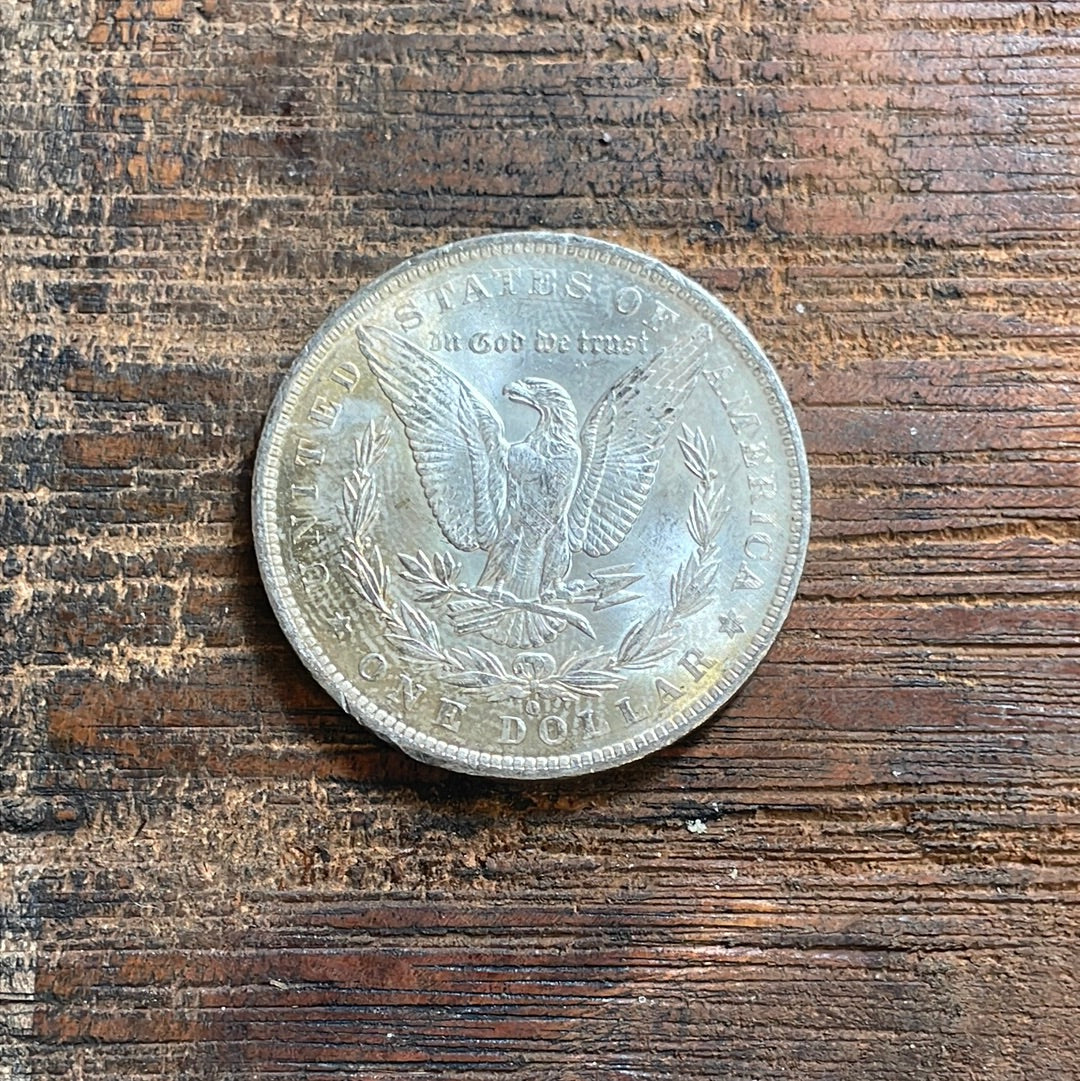 1883-O $1 US Morgan Silver Dollar.