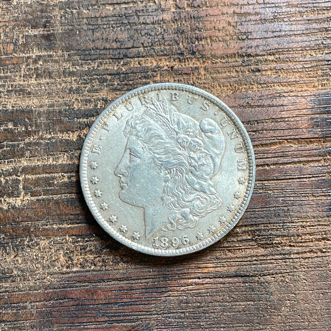 1896 $1 US Morgan Silver Dollar.