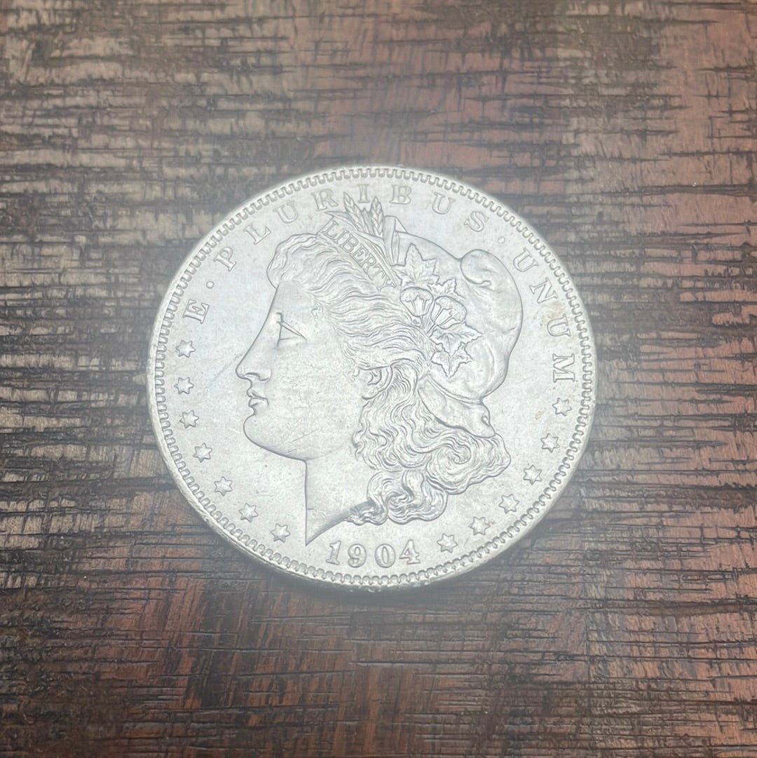 1904-O $1 US Morgan Silver Dollar