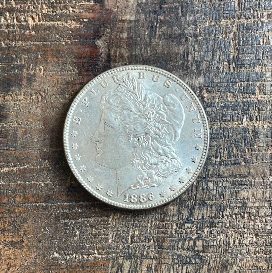 1886 $1 US Morgan Silver Dollar