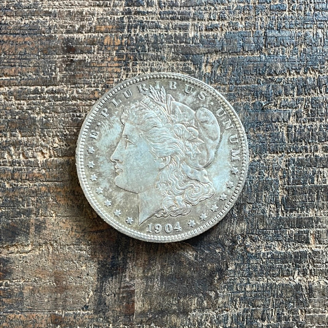 1904-O $1 US Morgan Silver Dollar