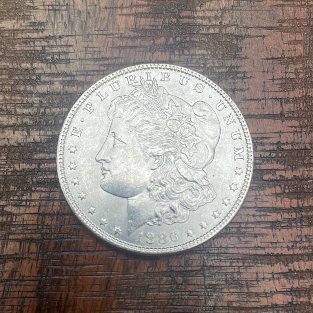 1886 $1 US Morgan Silver Dollar