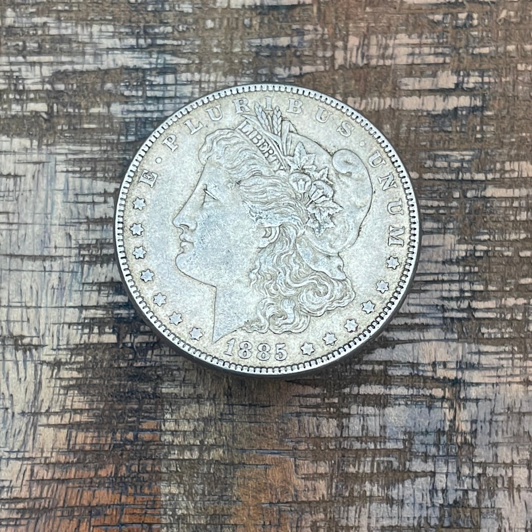 1885 $1 US Morgan Silver Dollar.