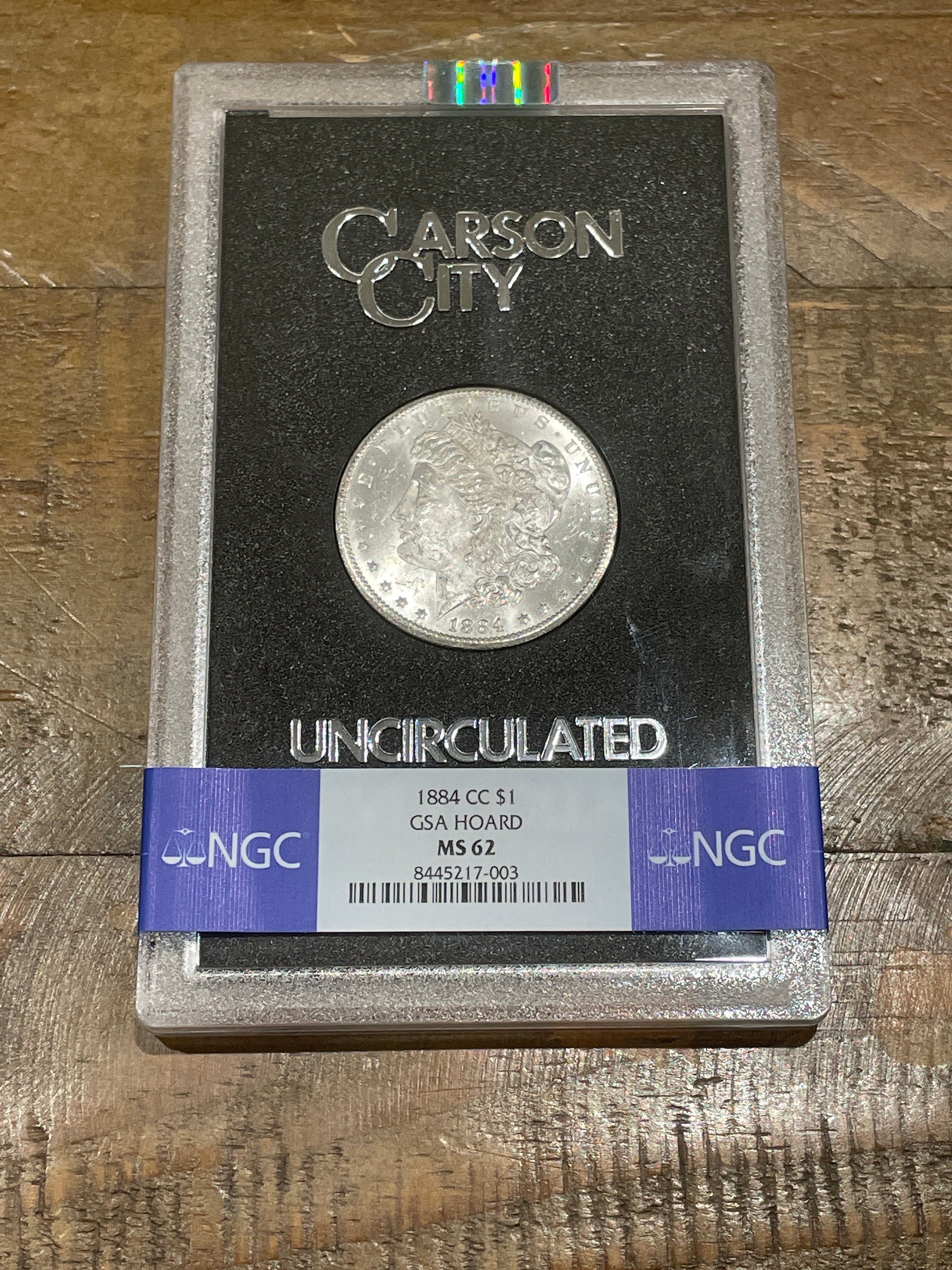 1884-CC $1 Morgan Silver Dollar GSA Hoard NGC MS62 in OGP VAM 6