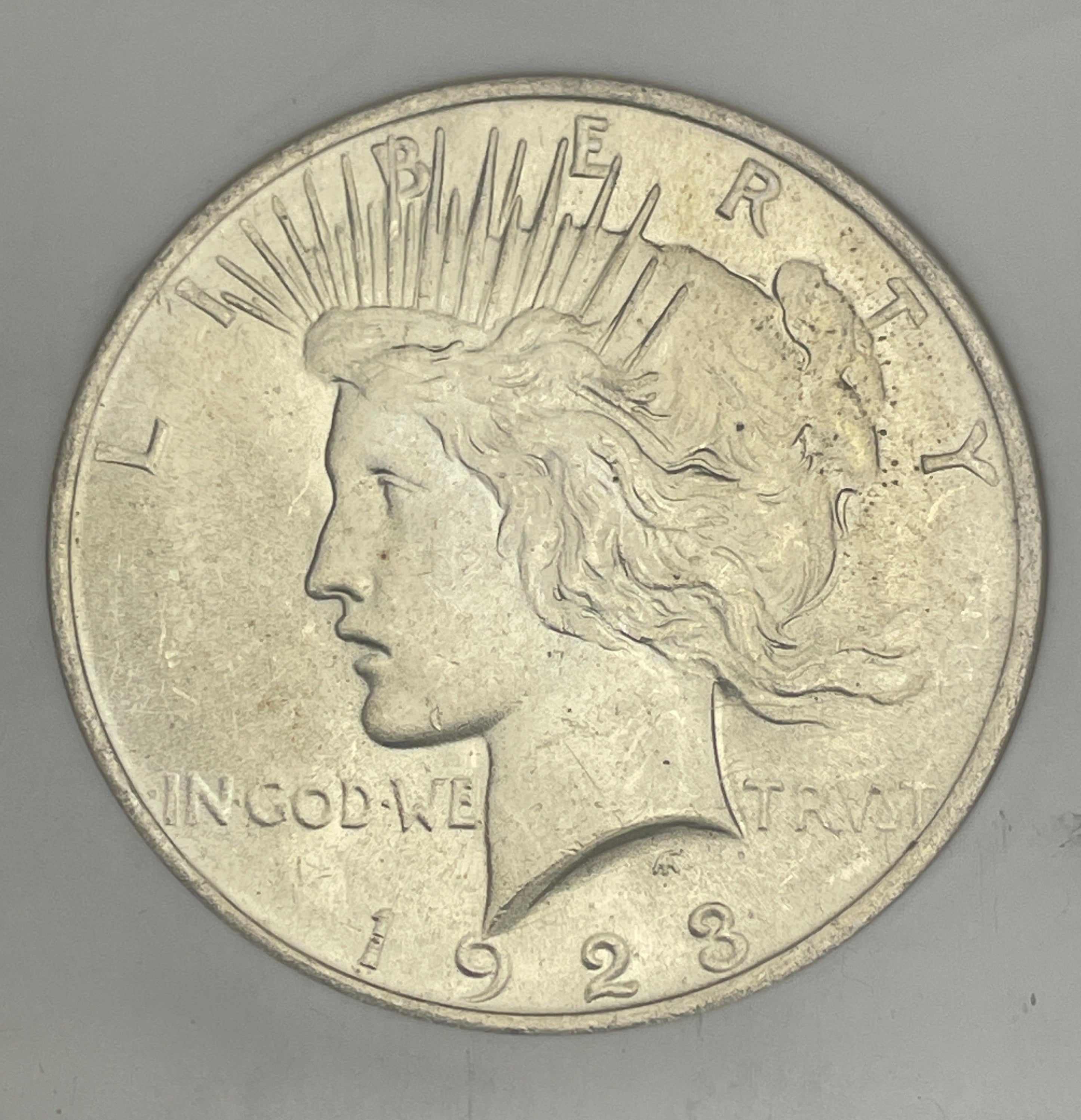 1923 US $1 Peace Silver Dollar NGC MS64