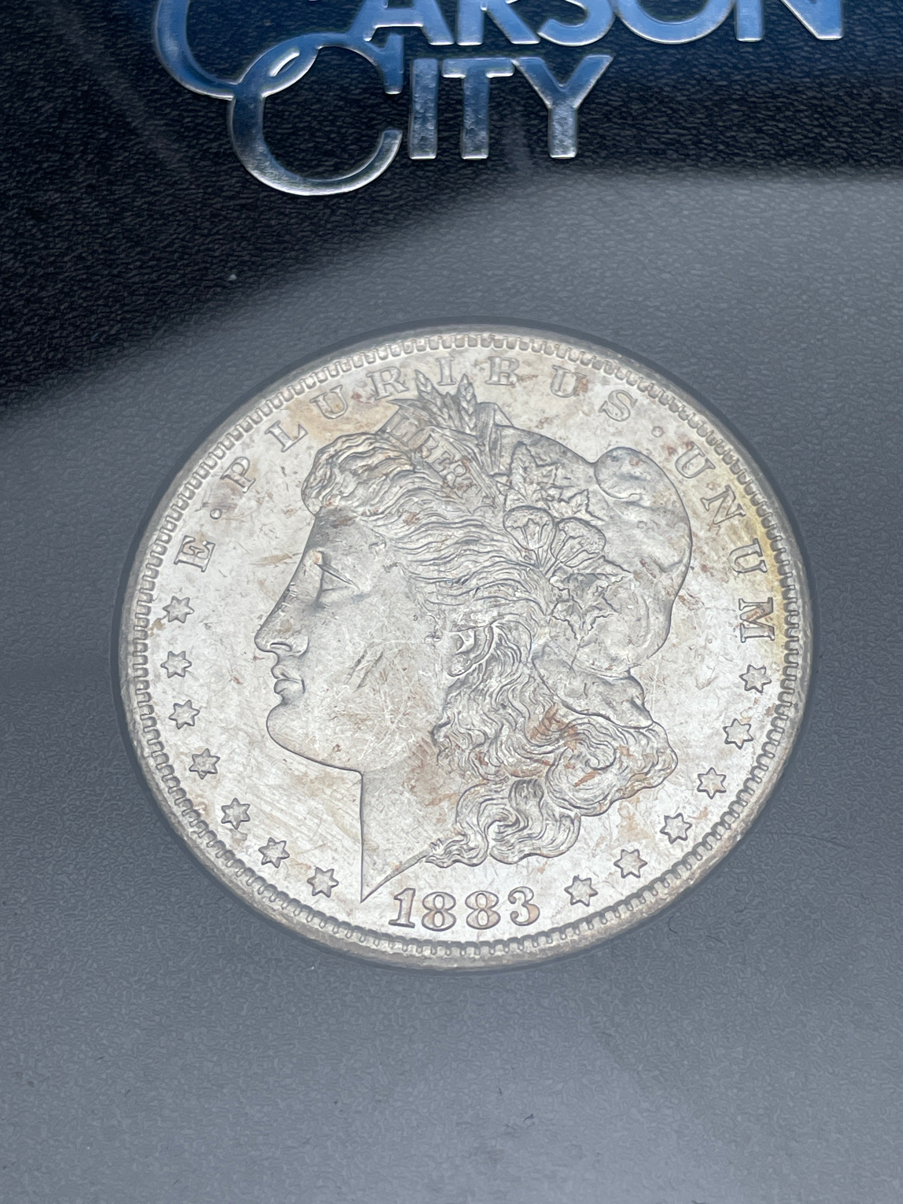 1883-CC $1 US Morgan Silver Dollar GSA Carson City