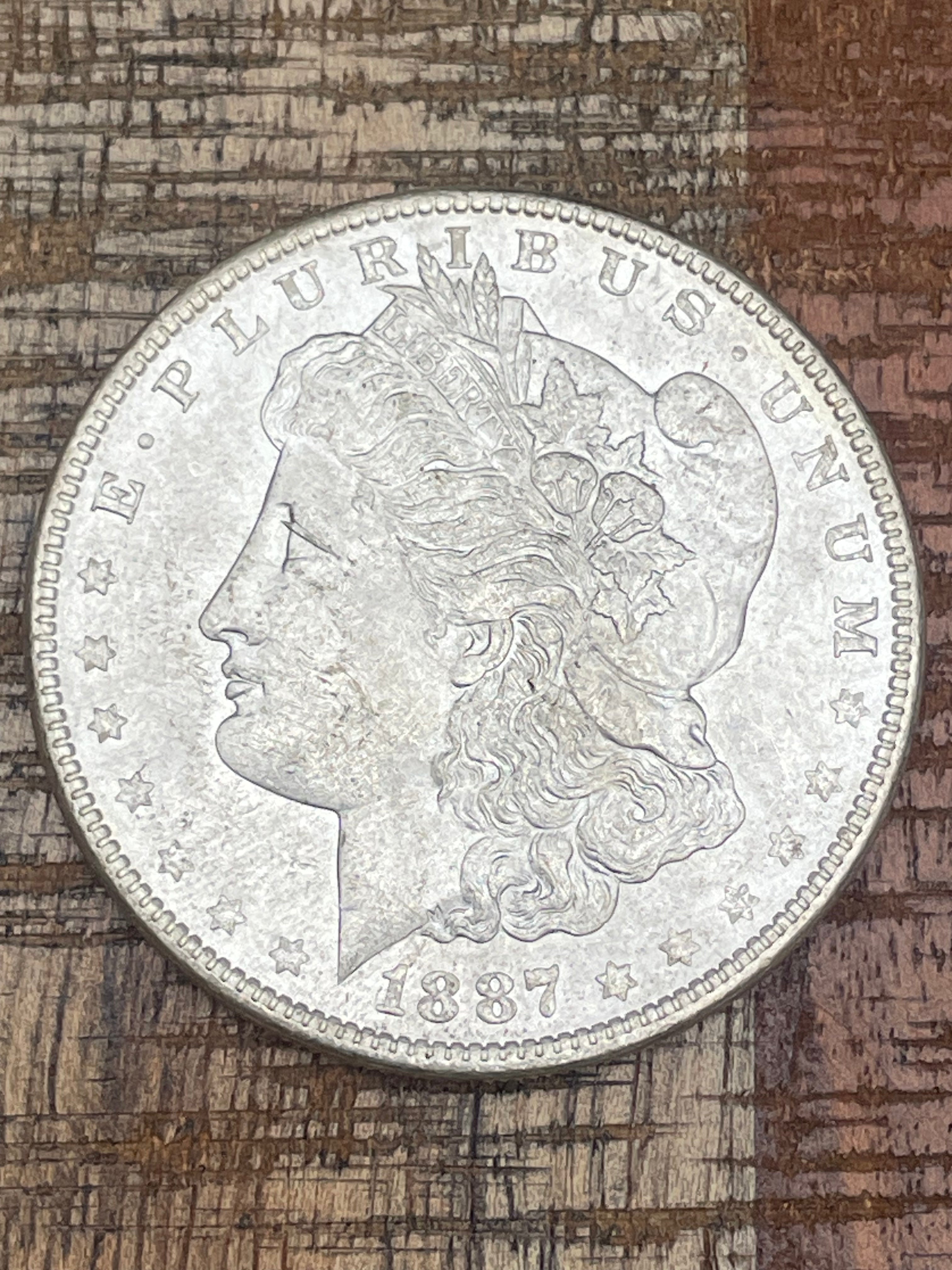 1887 $1 US Morgan Silver Dollar