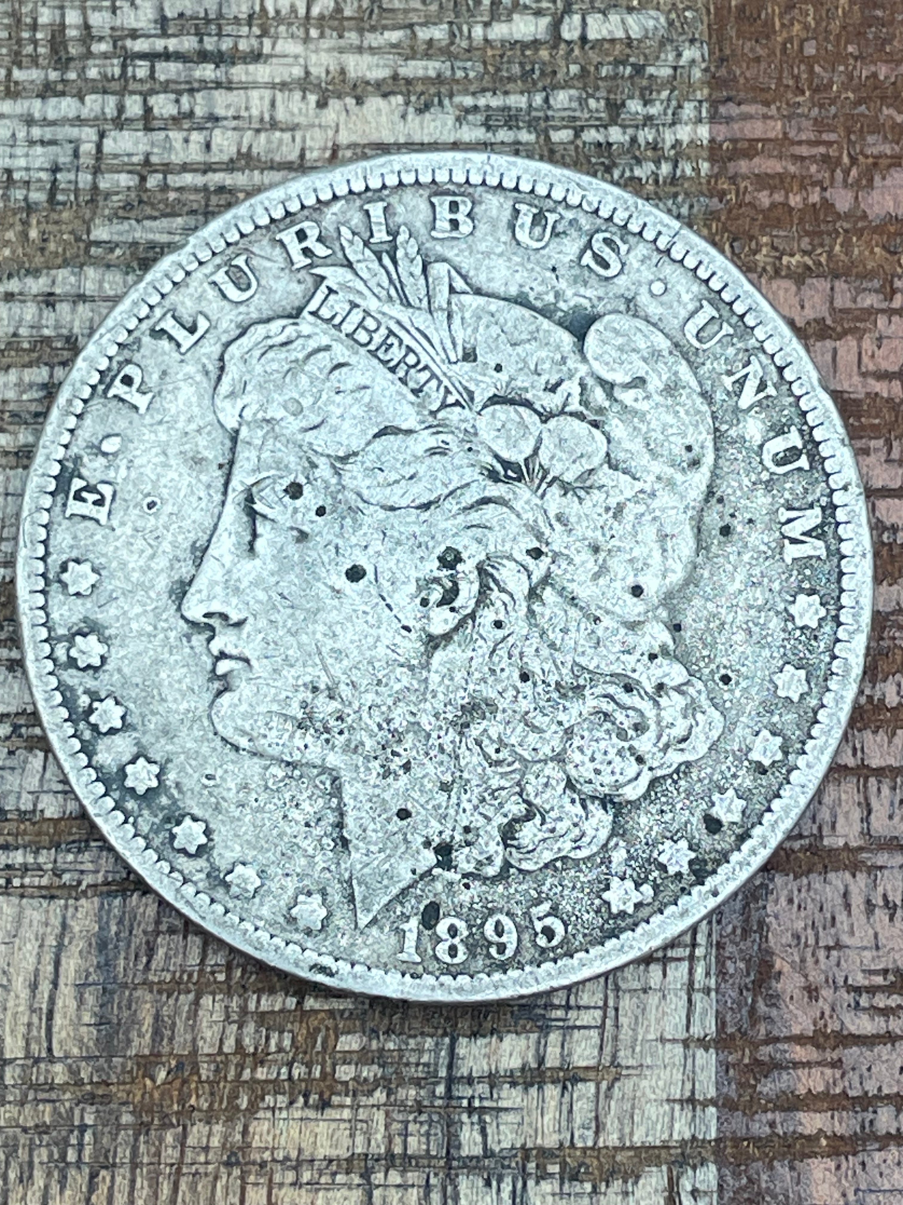 1895-O $1 US Morgan Silver Dollar