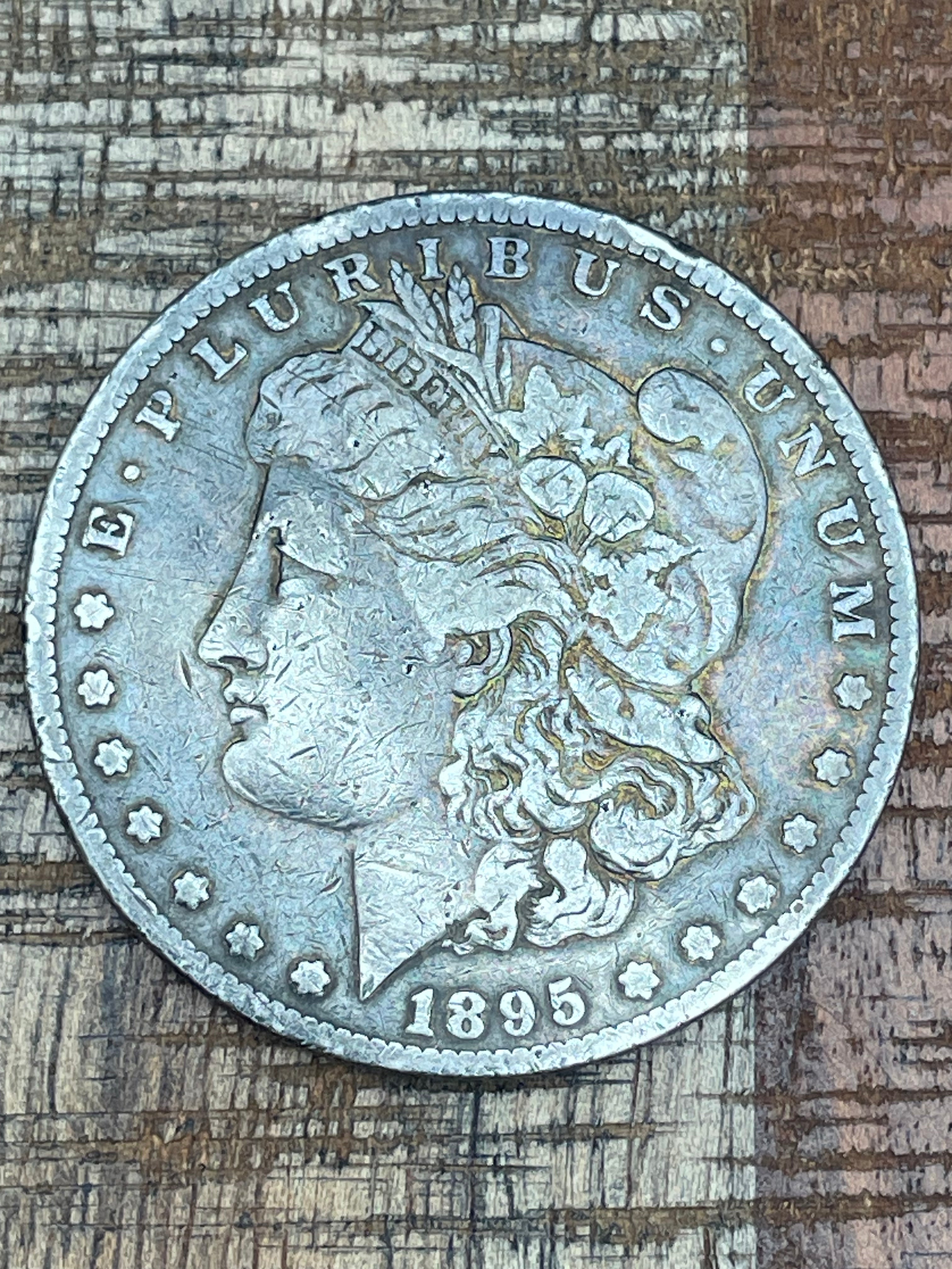 1895-O $1 US Morgan Silver Dollar