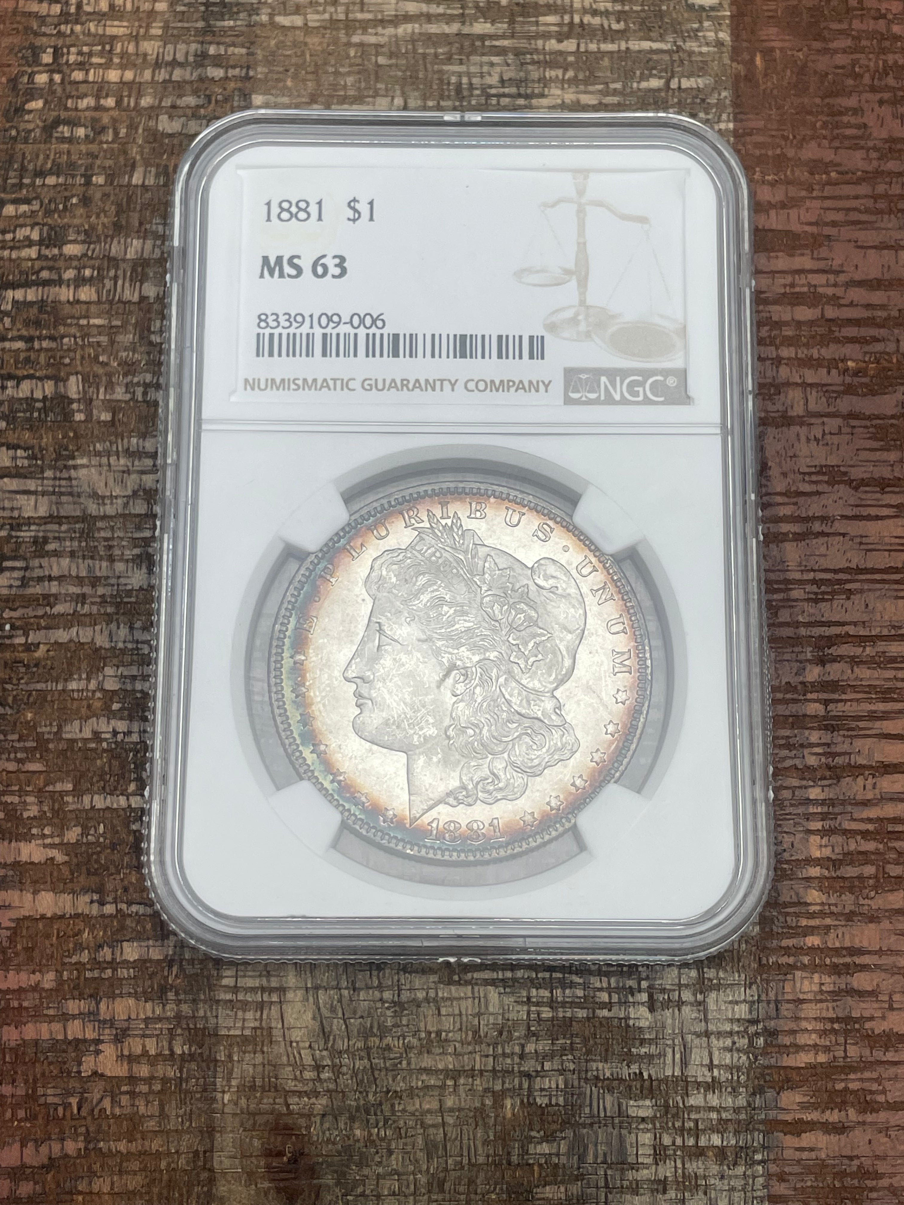 1881 $1 US Silver Morgan Dollar NGC MS63