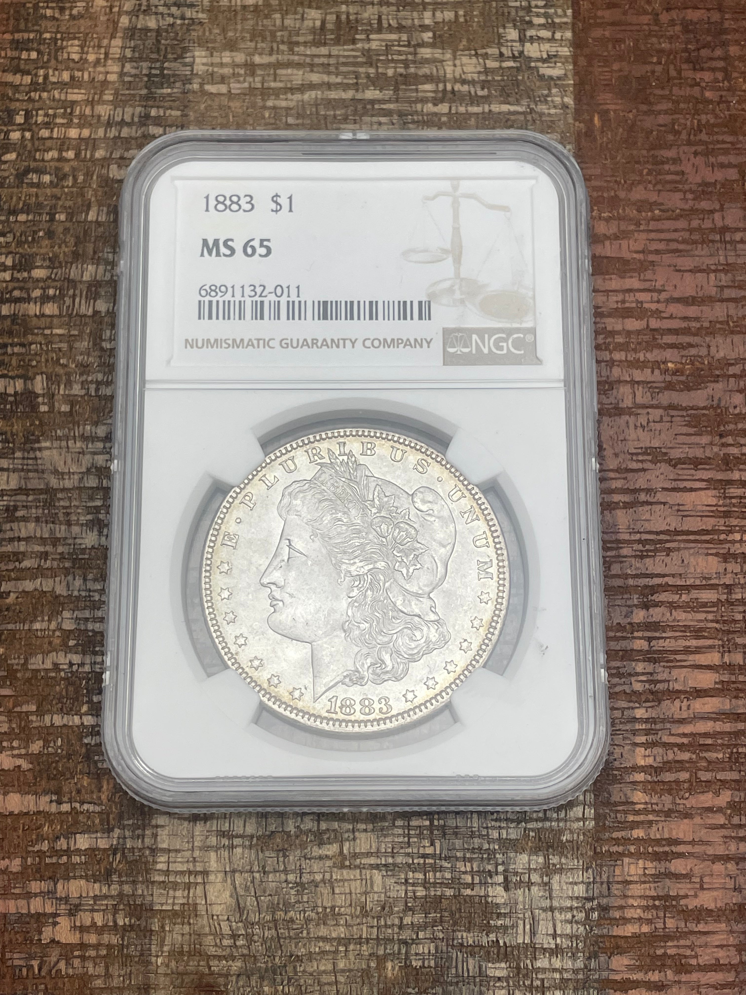 1883 $1 US Morgan Silver Dollar NGC MS65