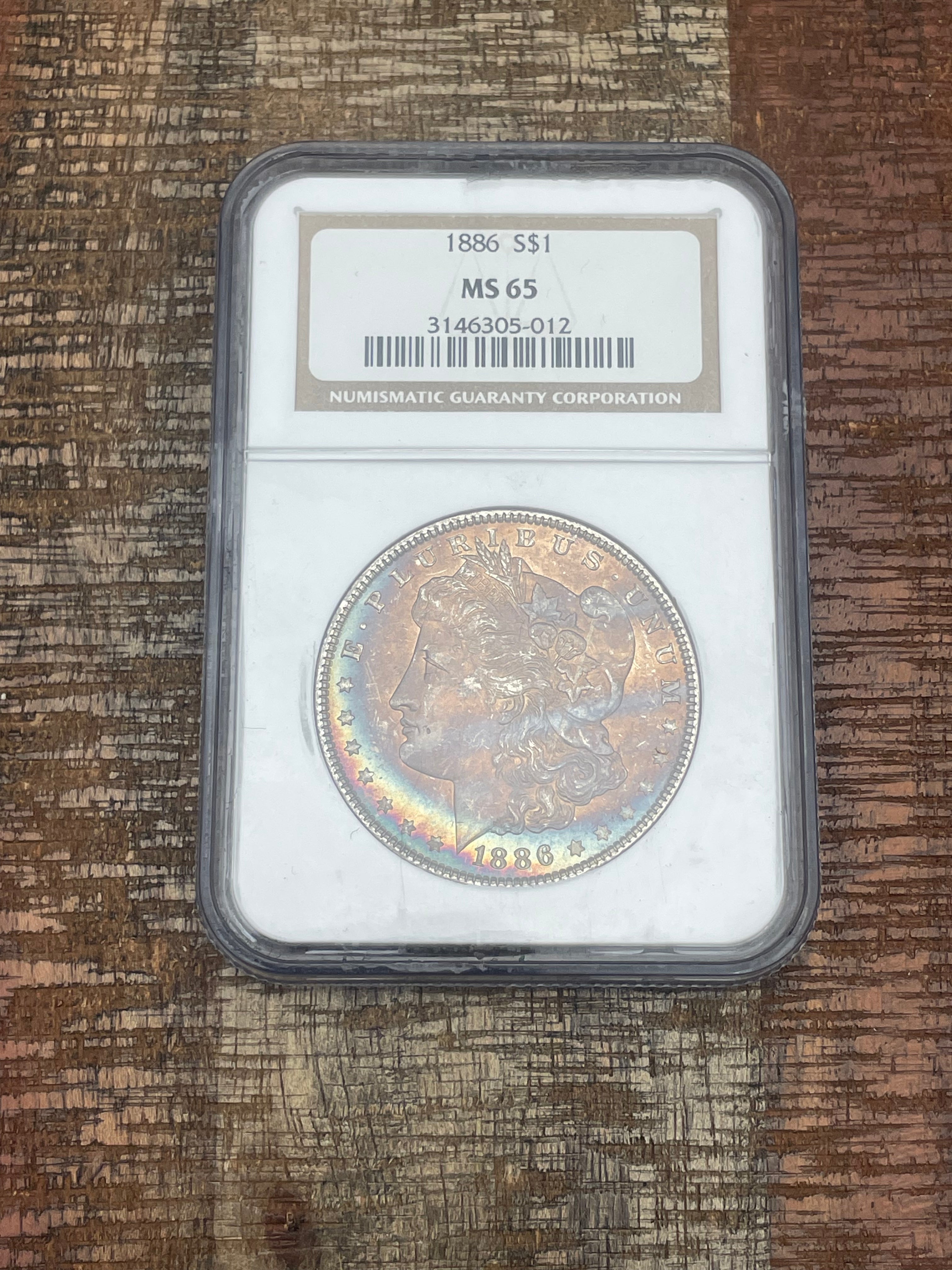 1886 $1 US Morgan Silver Dollar NGC MS65