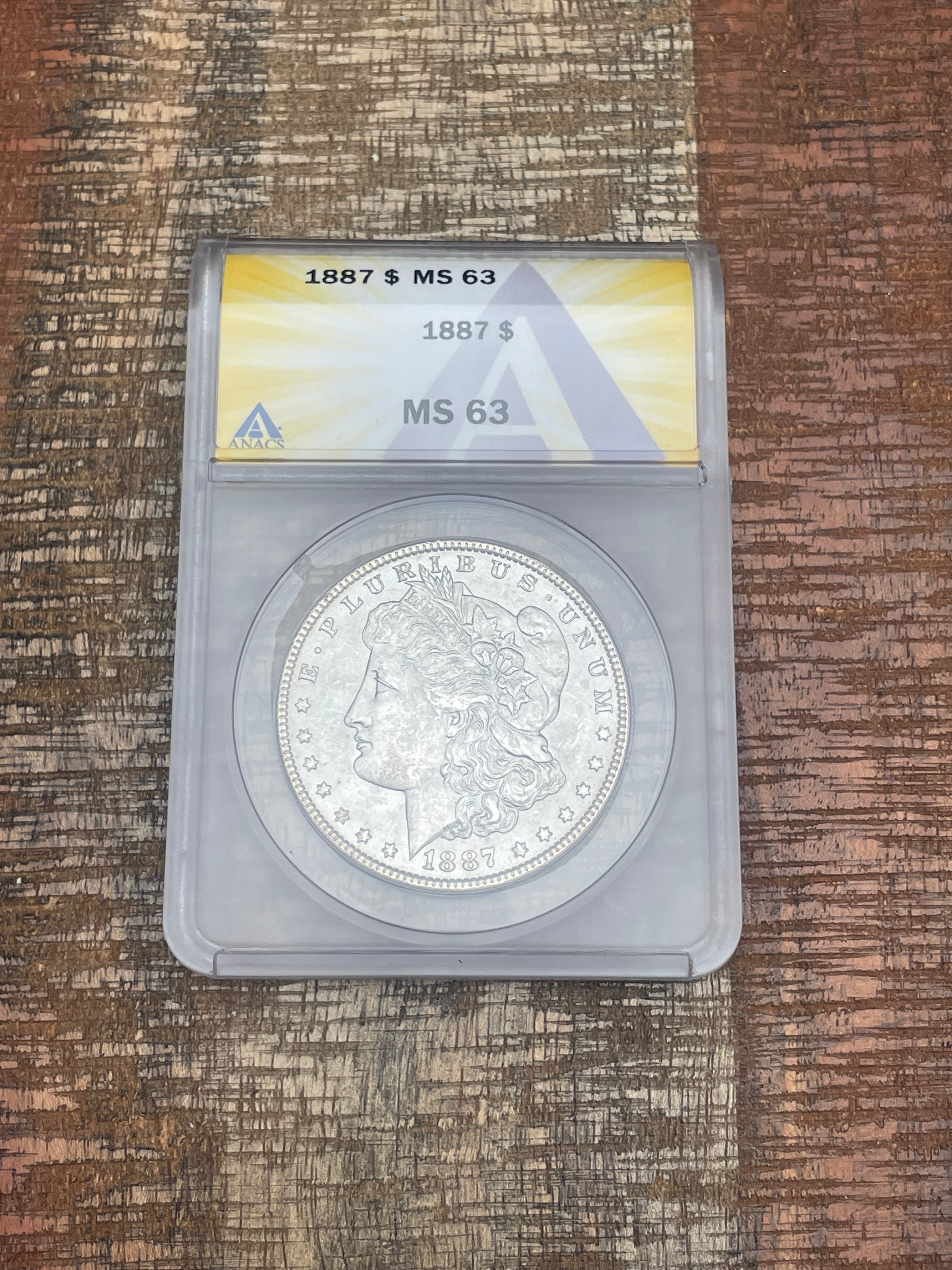 1887 $1 US Morgan Silver Dollar ANACS MS63