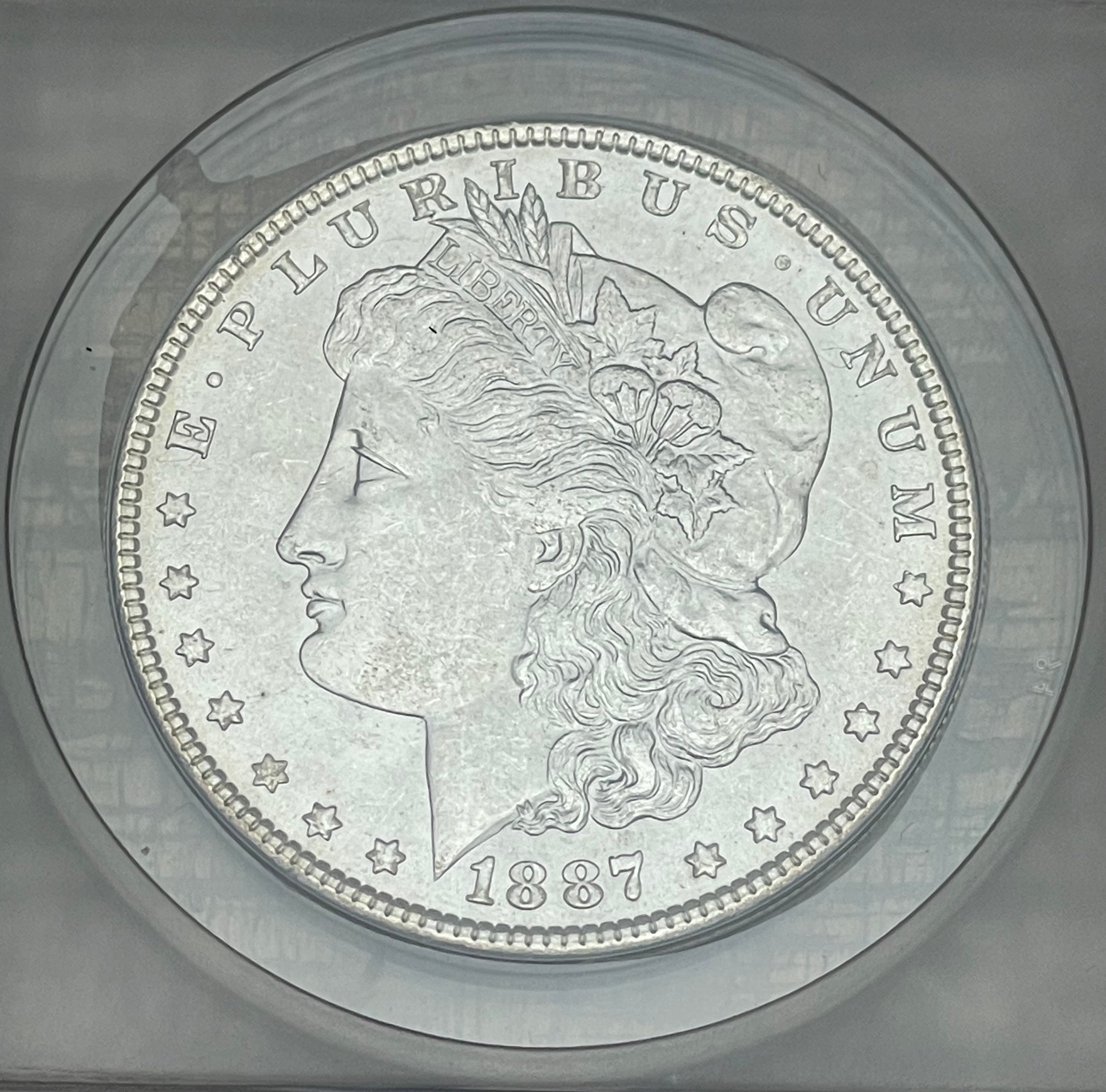1887 $1 US Morgan Silver Dollar ANACS MS63