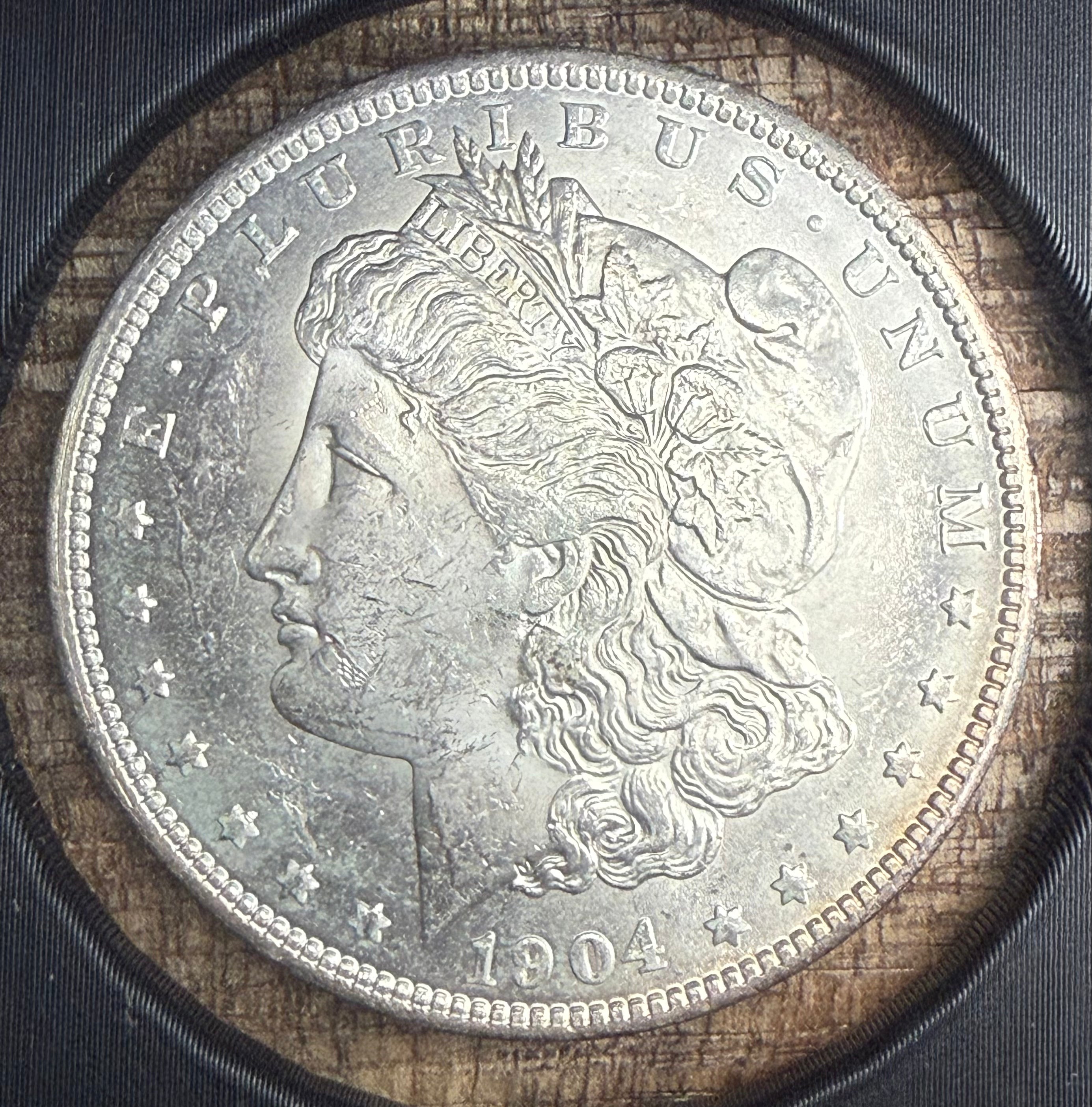 1904-O $1 US Morgan Silver Dollar