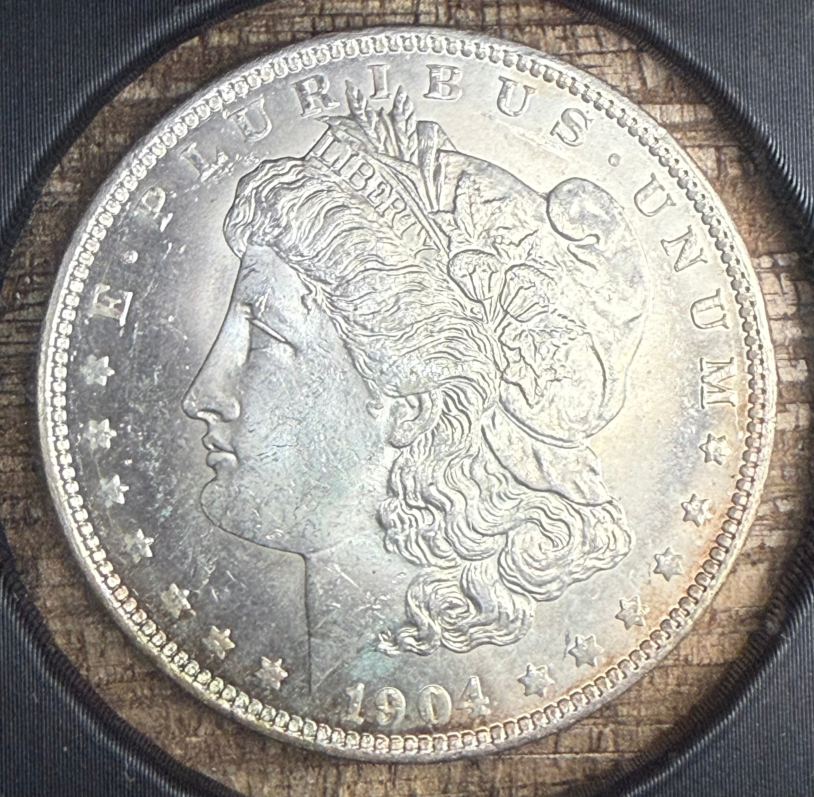 1904-O $1 US Morgan Silver Dollar