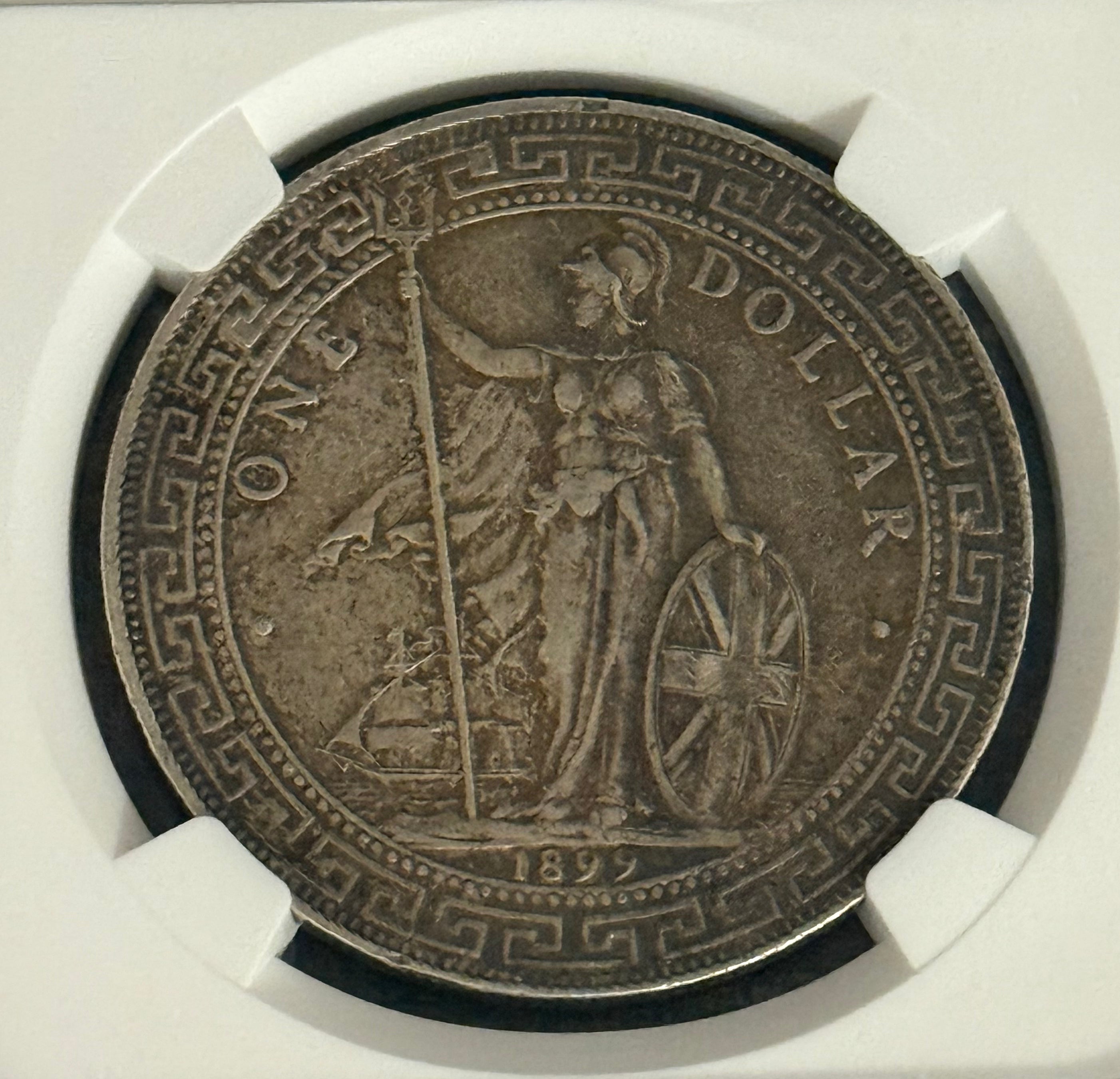 1899-B $1 G. Britain Trade Dollar ~ NGC  AU Details-Chopmarked, Cleaned